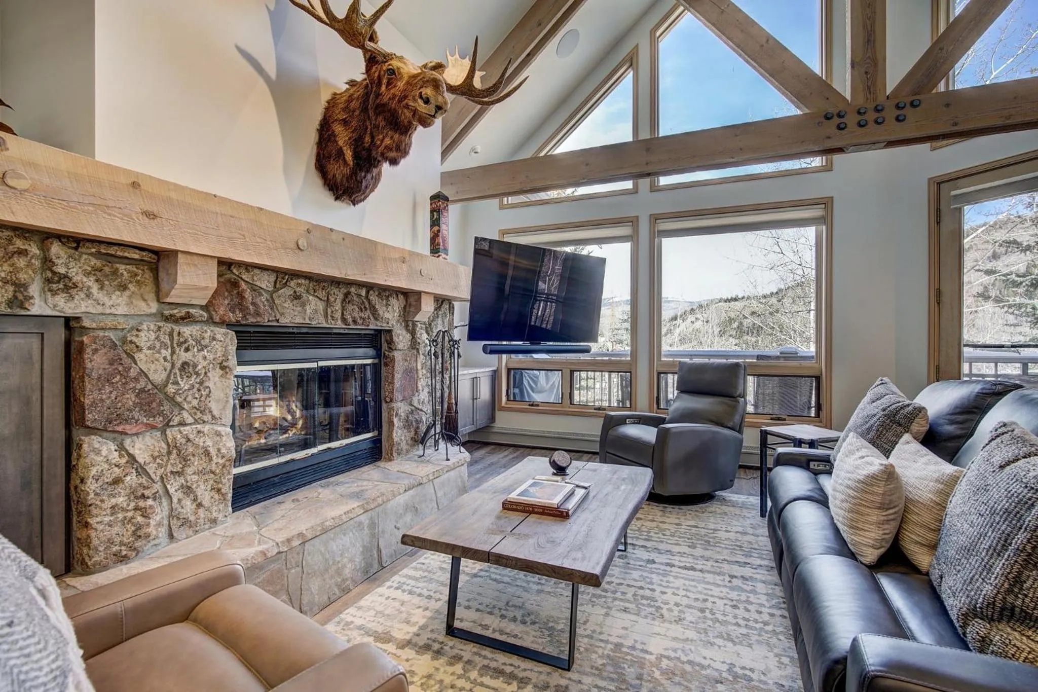Living room in The Pines Lodge, a RockResort, by Vail Resorts