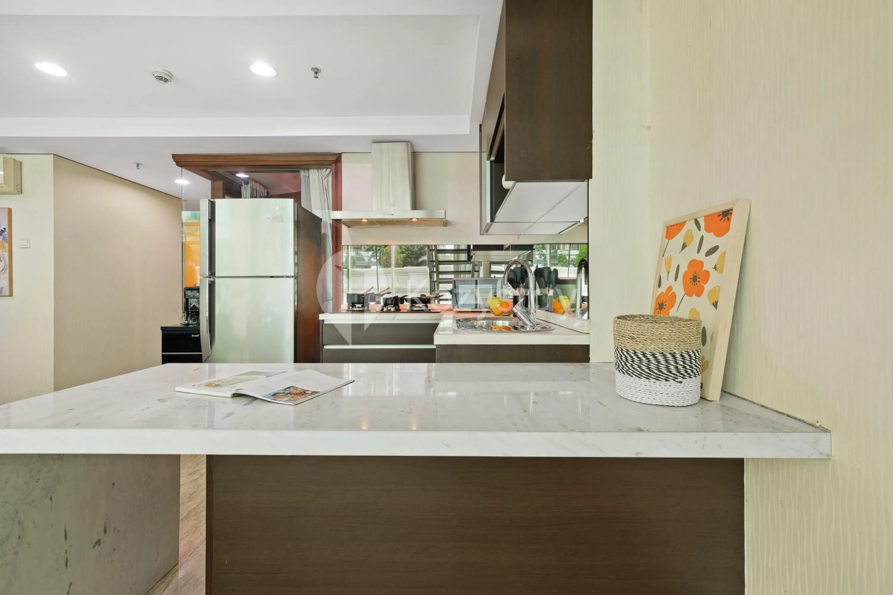 Kitchen or kitchenette in Callisto by Kozystay - Mega Kuningan