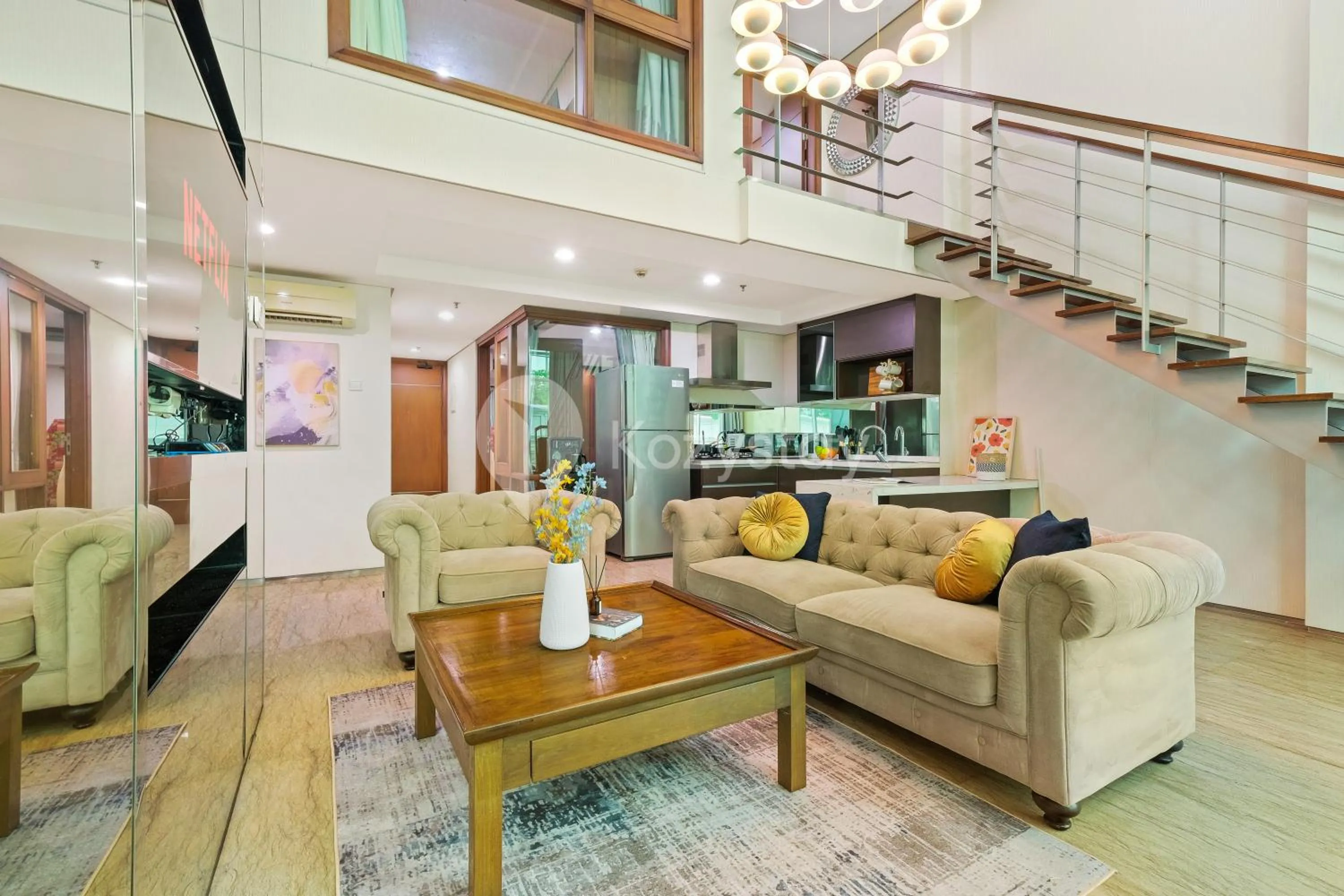 Living room in Callisto by Kozystay - Mega Kuningan