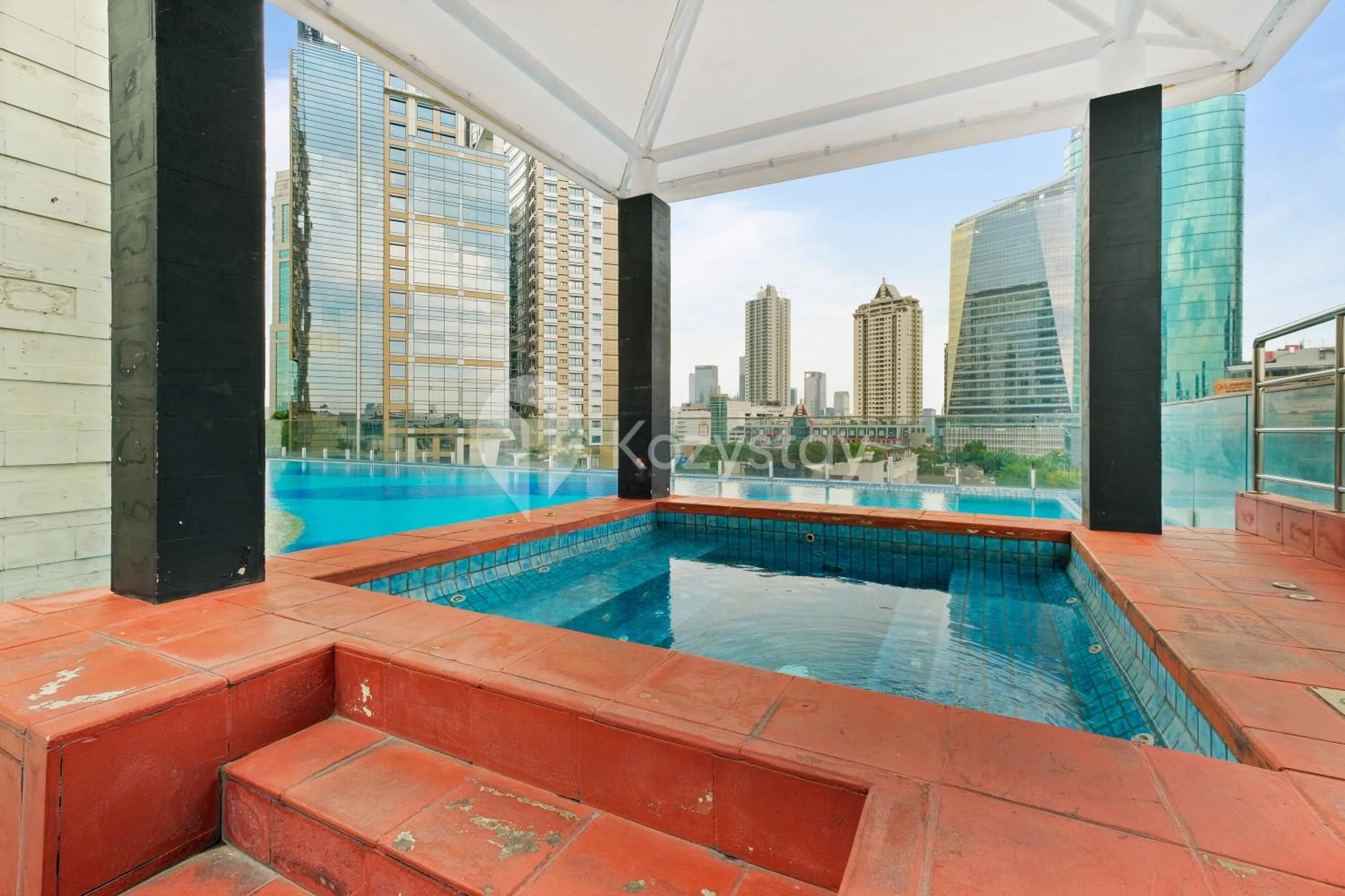 Swimming pool in Callisto by Kozystay - Mega Kuningan
