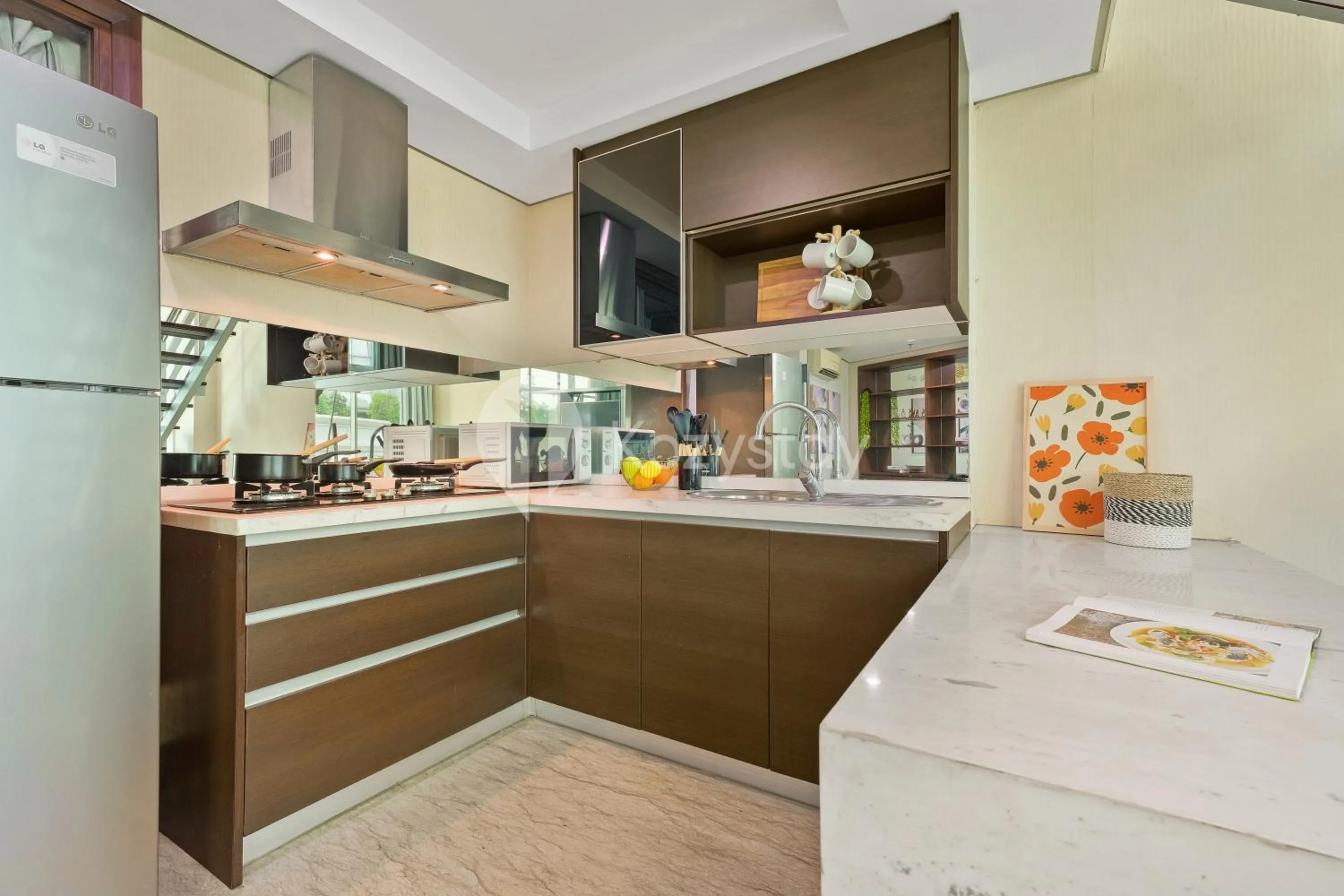 Kitchen or kitchenette in Callisto by Kozystay - Mega Kuningan