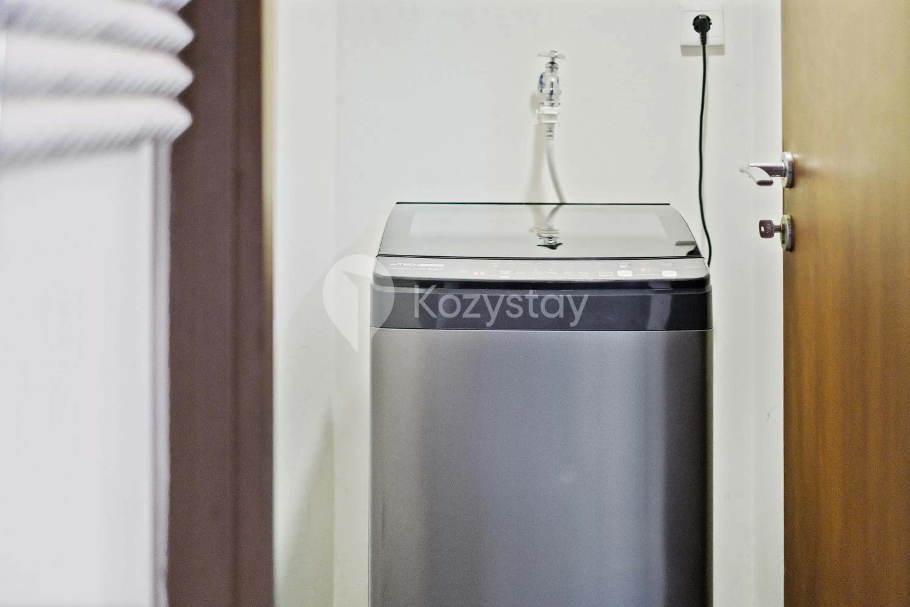 washing machine in Callisto by Kozystay - Mega Kuningan