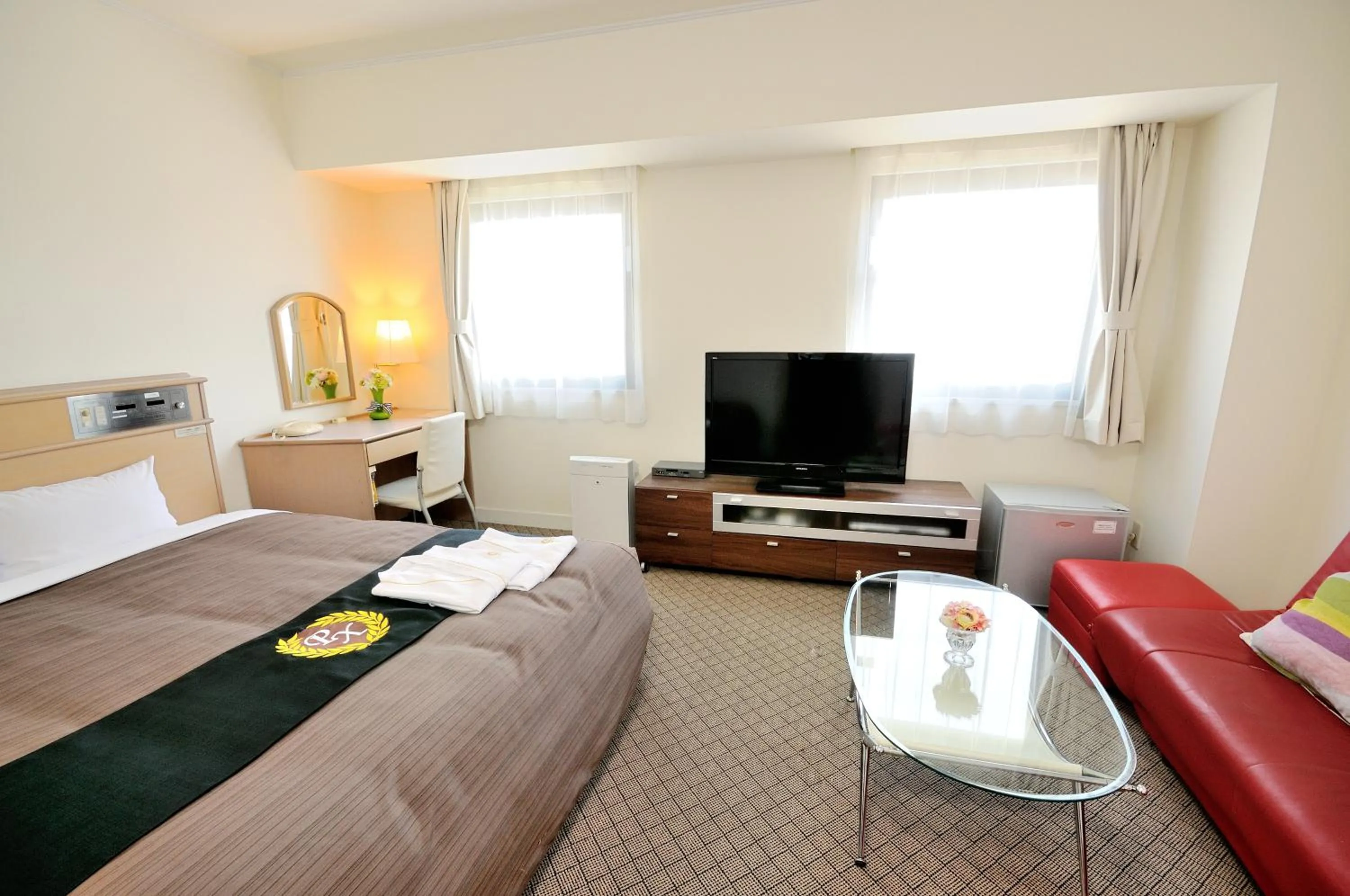 Bed in Grand Park Hotel Panex Kimitsu