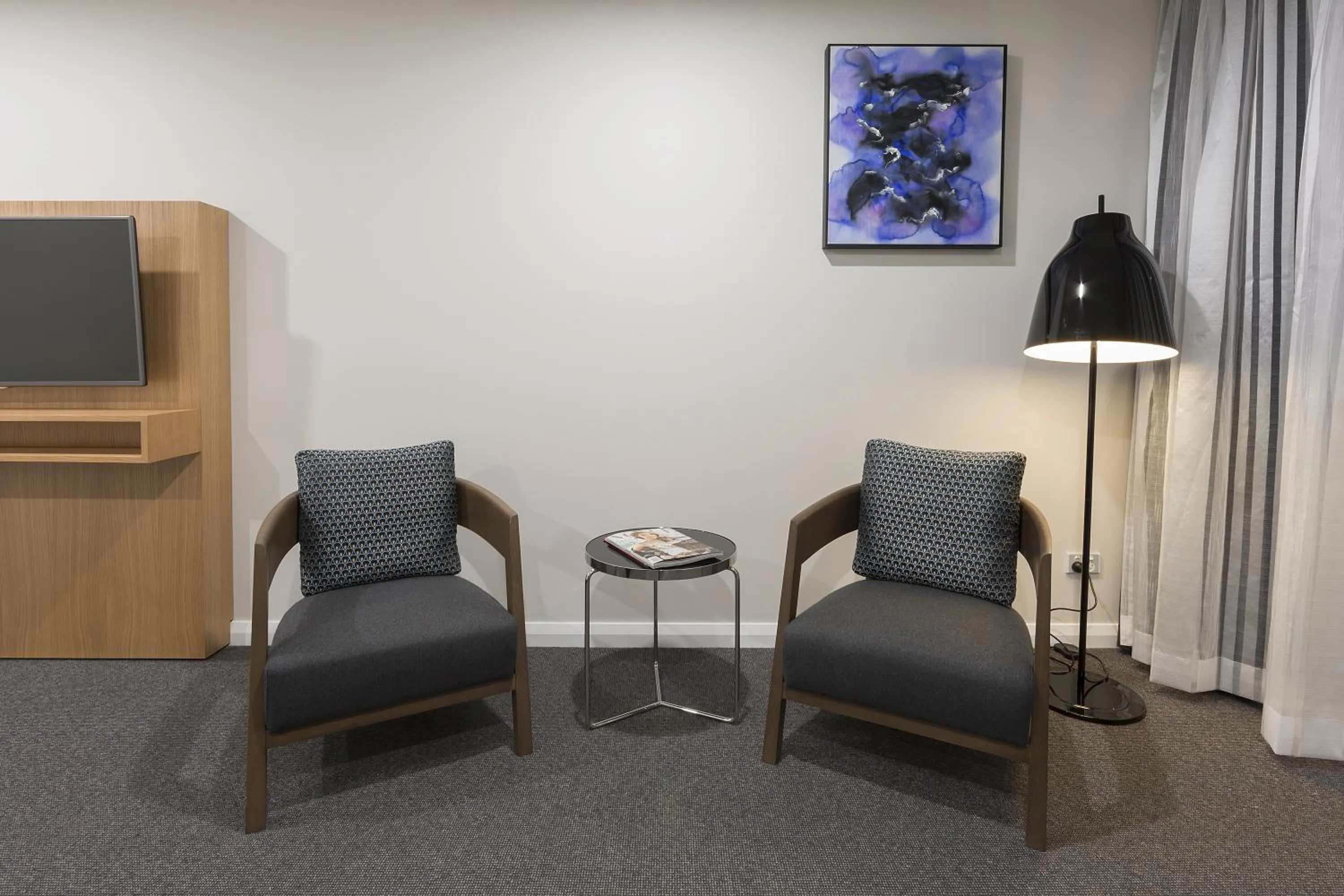 Seating area in Avenue Hotel Canberra