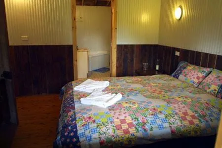 Bedroom, Bed in Lovedale Cottages Hunter Valley