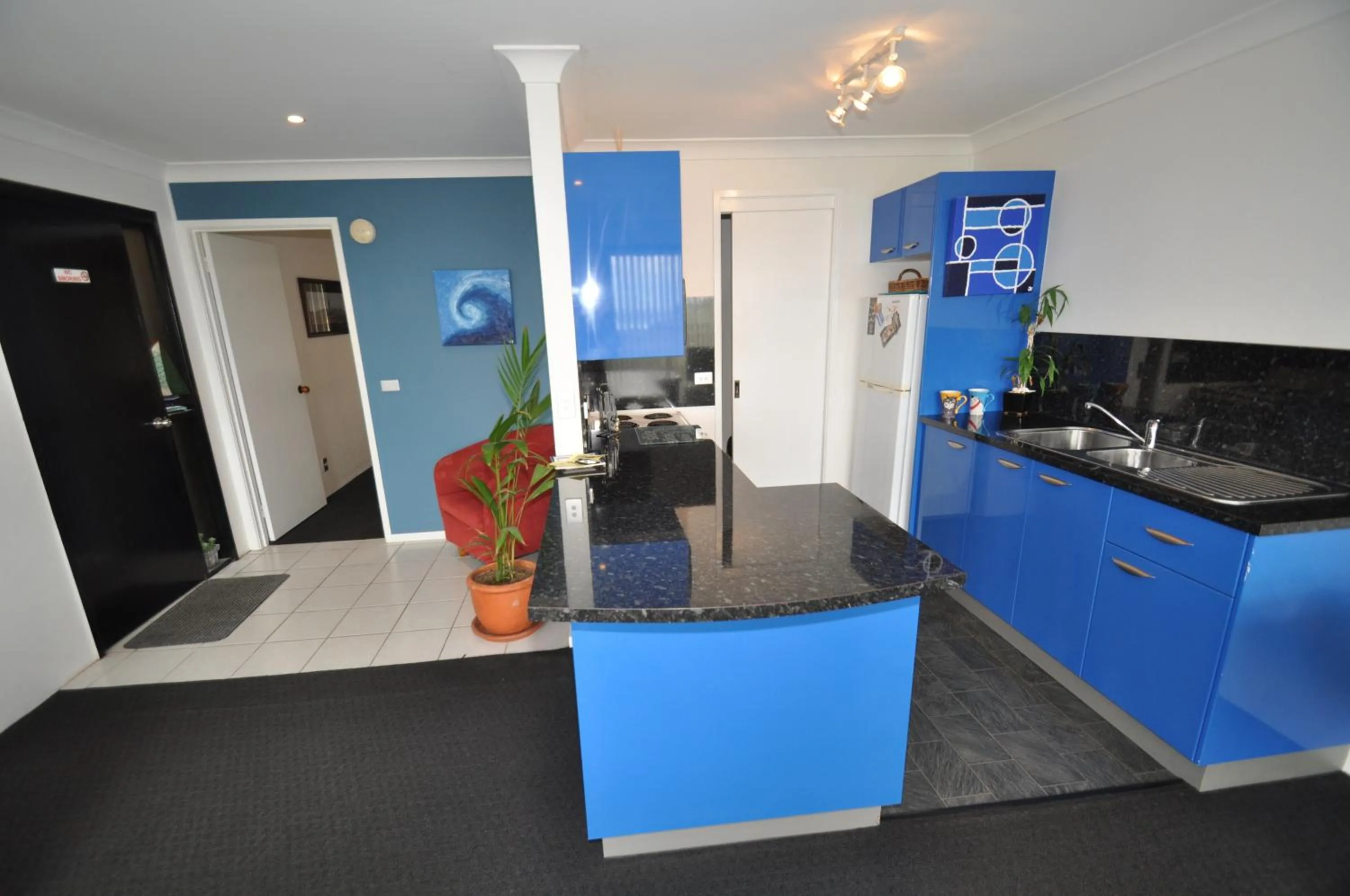 Kitchen or kitchenette in Beachfront Apartments