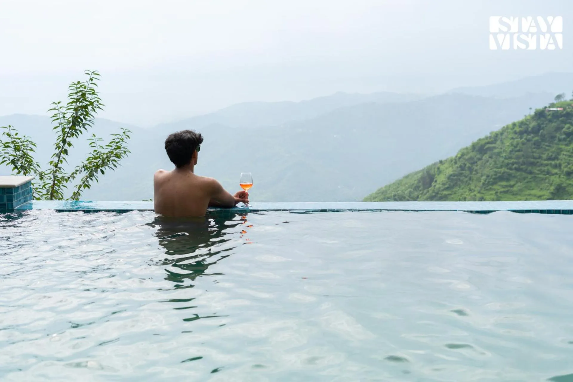 Swimming pool in StayVista at Savara with Heated Infinity Pool and Jacuzzi