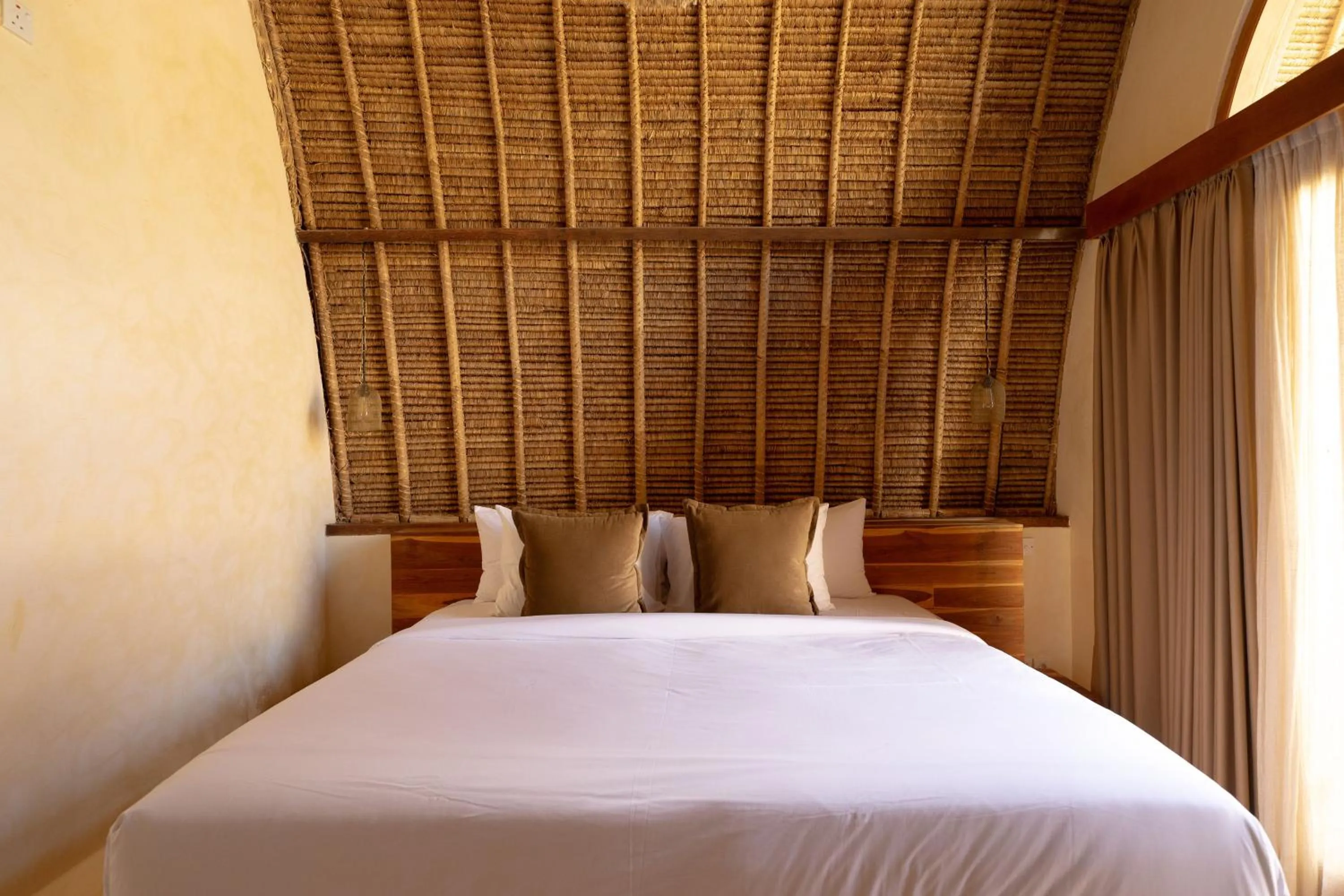Bed in Lulu's Villas
