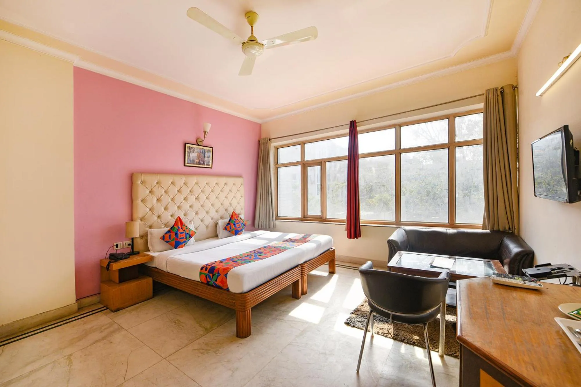 Bed in FabHotel Gracious Inn