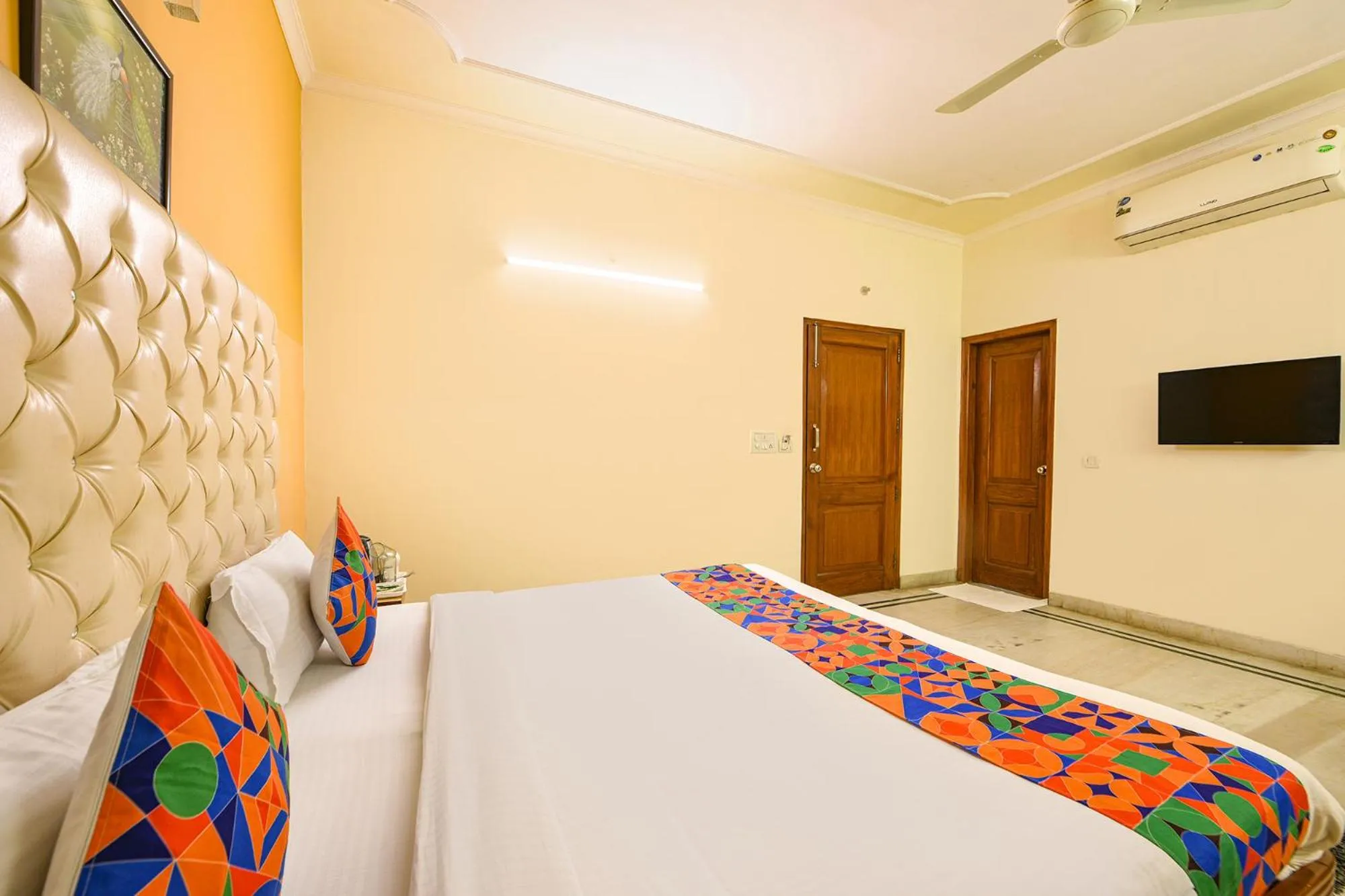 Bed in FabHotel Gracious Inn