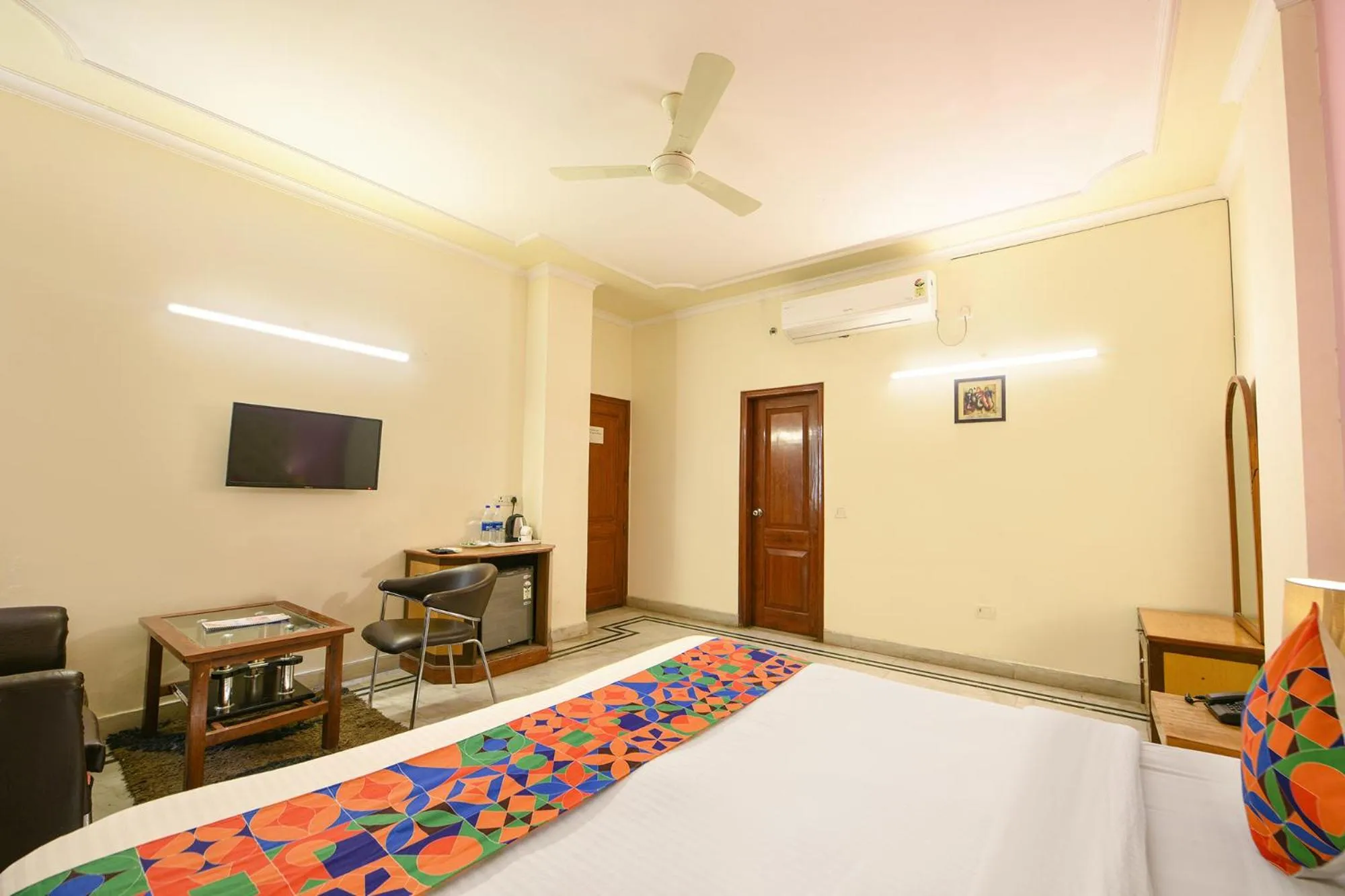 Bed in FabHotel Gracious Inn