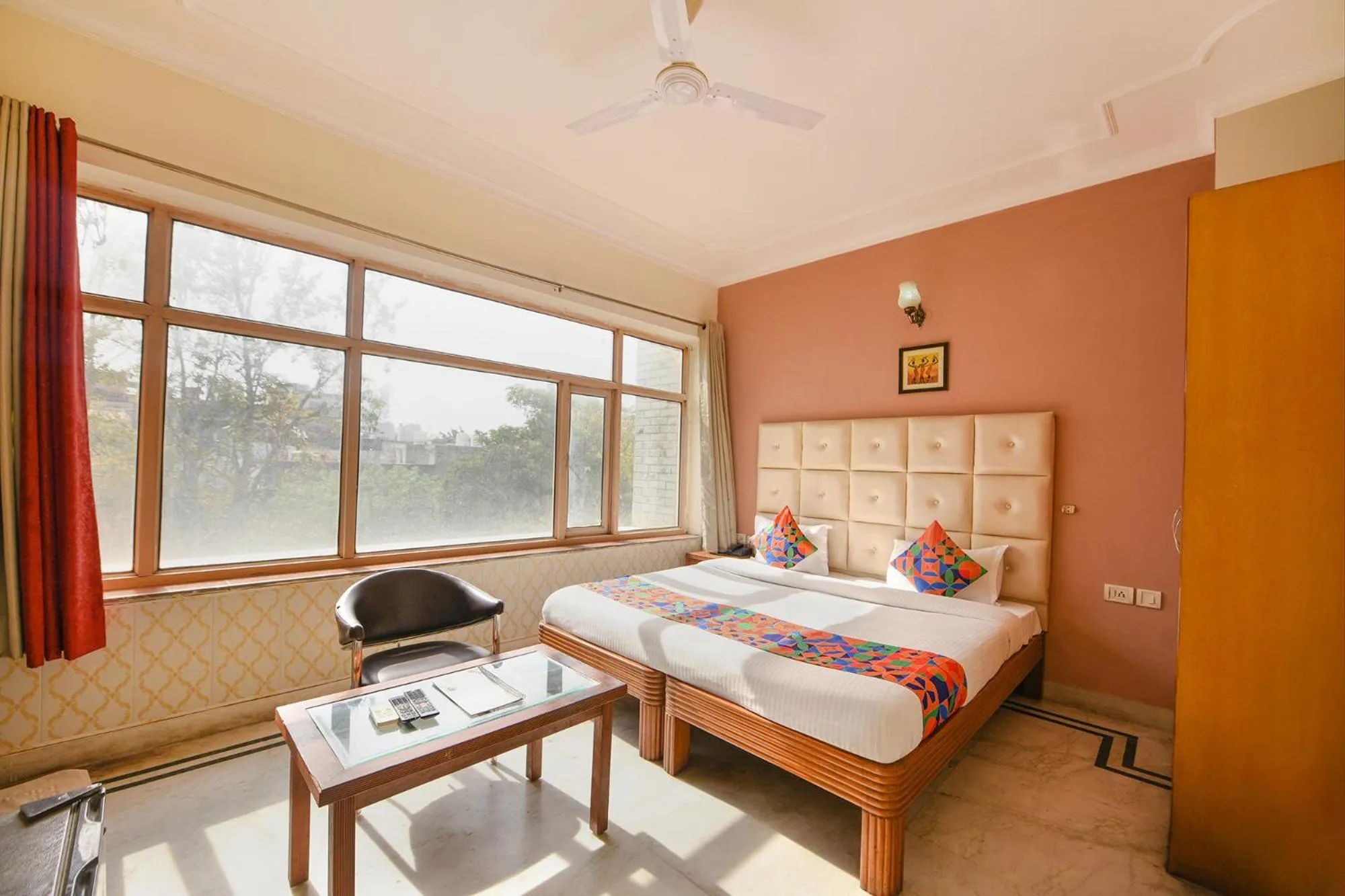 Bed in FabHotel Gracious Inn