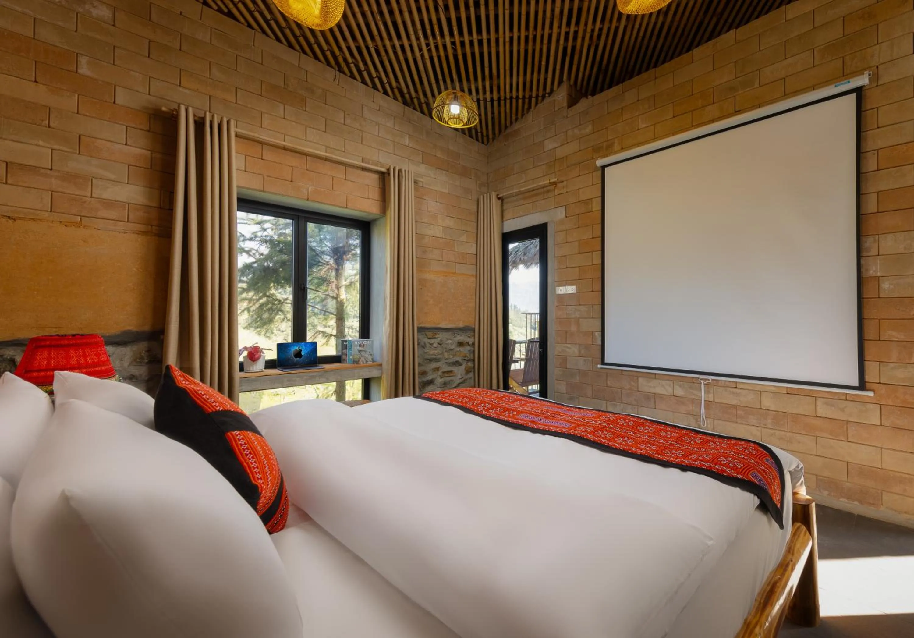 Bed in Sapaxa Spring Garden Ecolodge