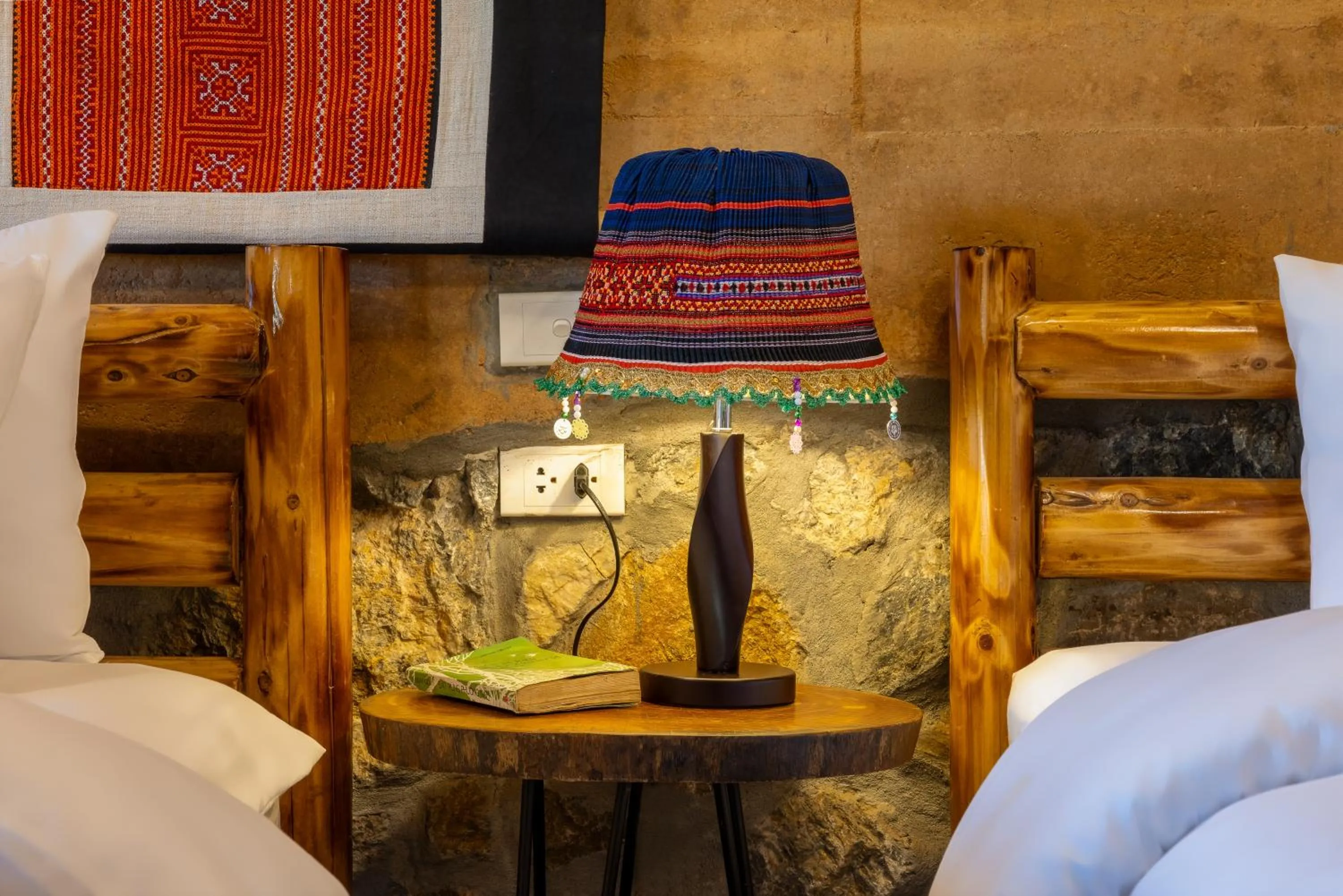 Bed in Sapaxa Spring Garden Ecolodge