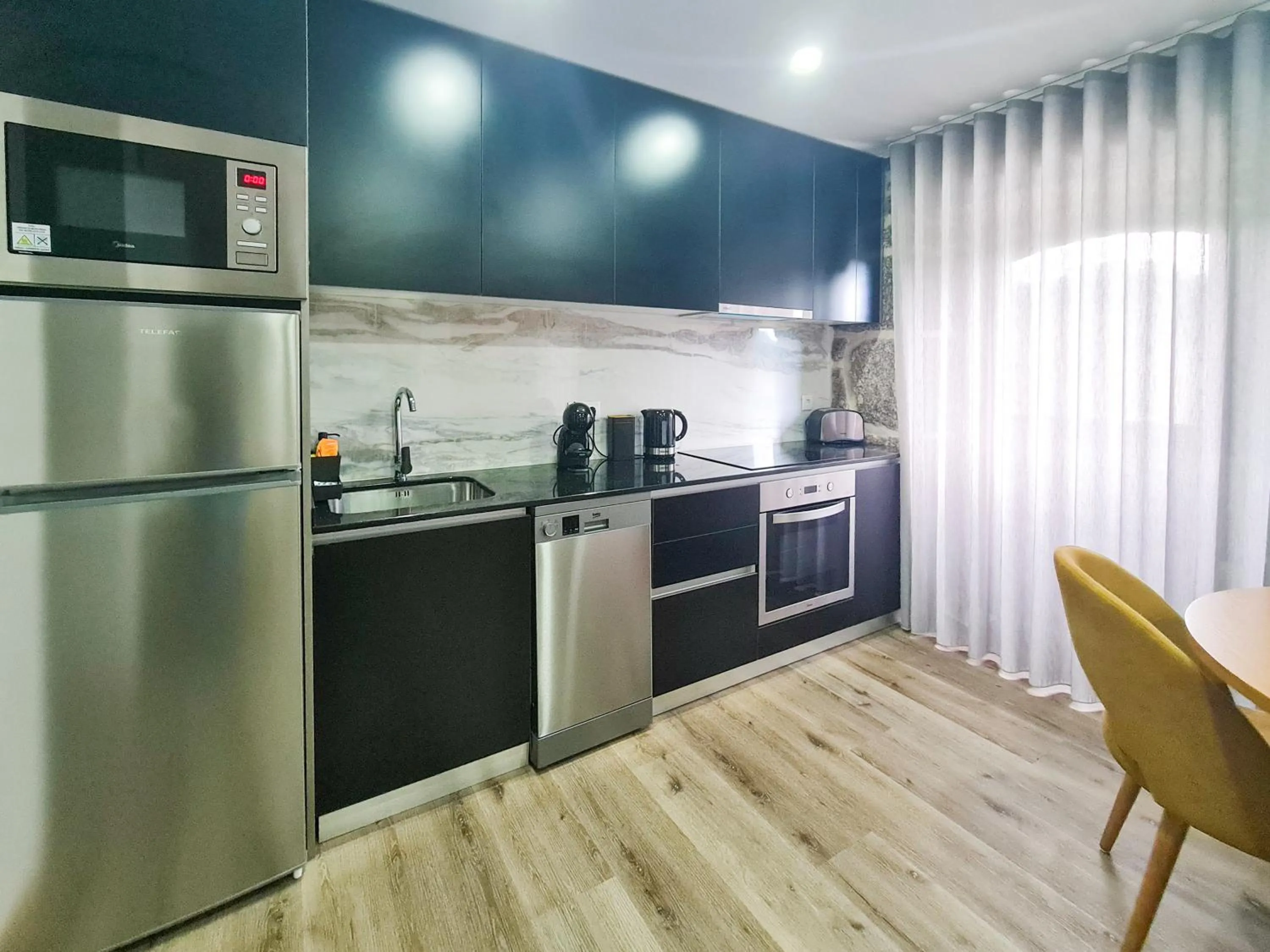kitchen in Casa d'Henrique Retreat Pool and Spa