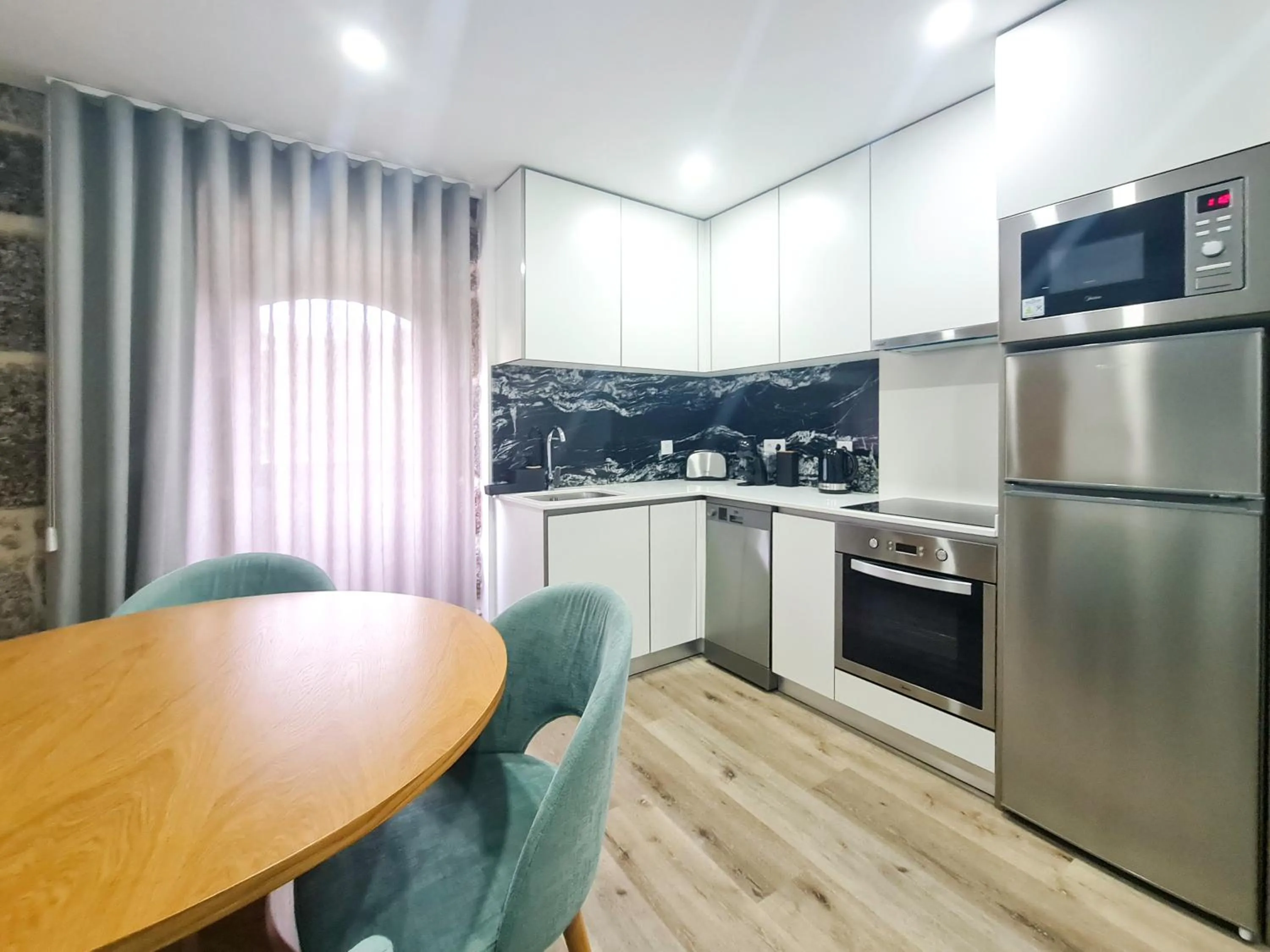 Kitchen or kitchenette in Casa d'Henrique Retreat Pool and Spa