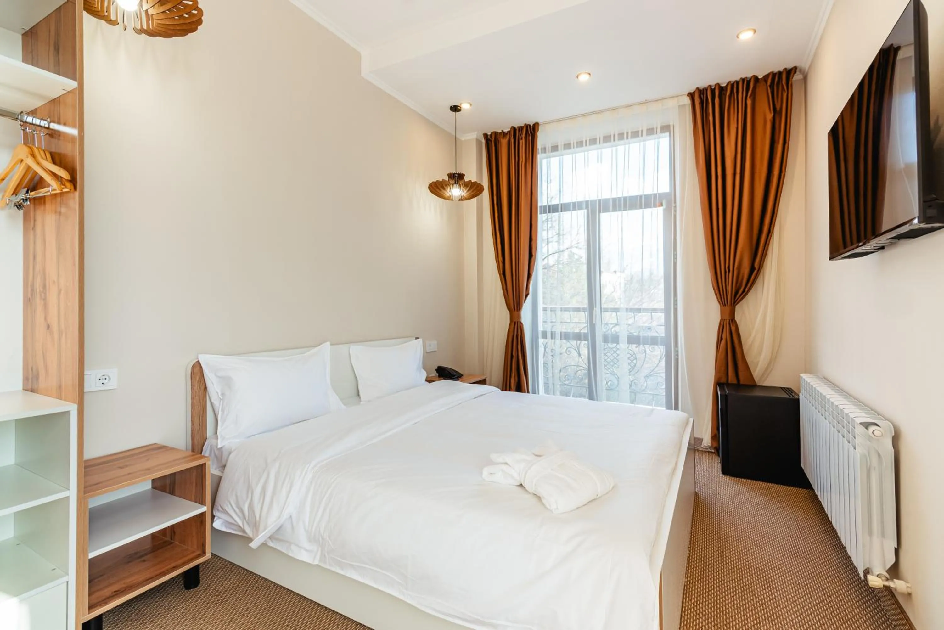 Bed in AYKUN Hotel