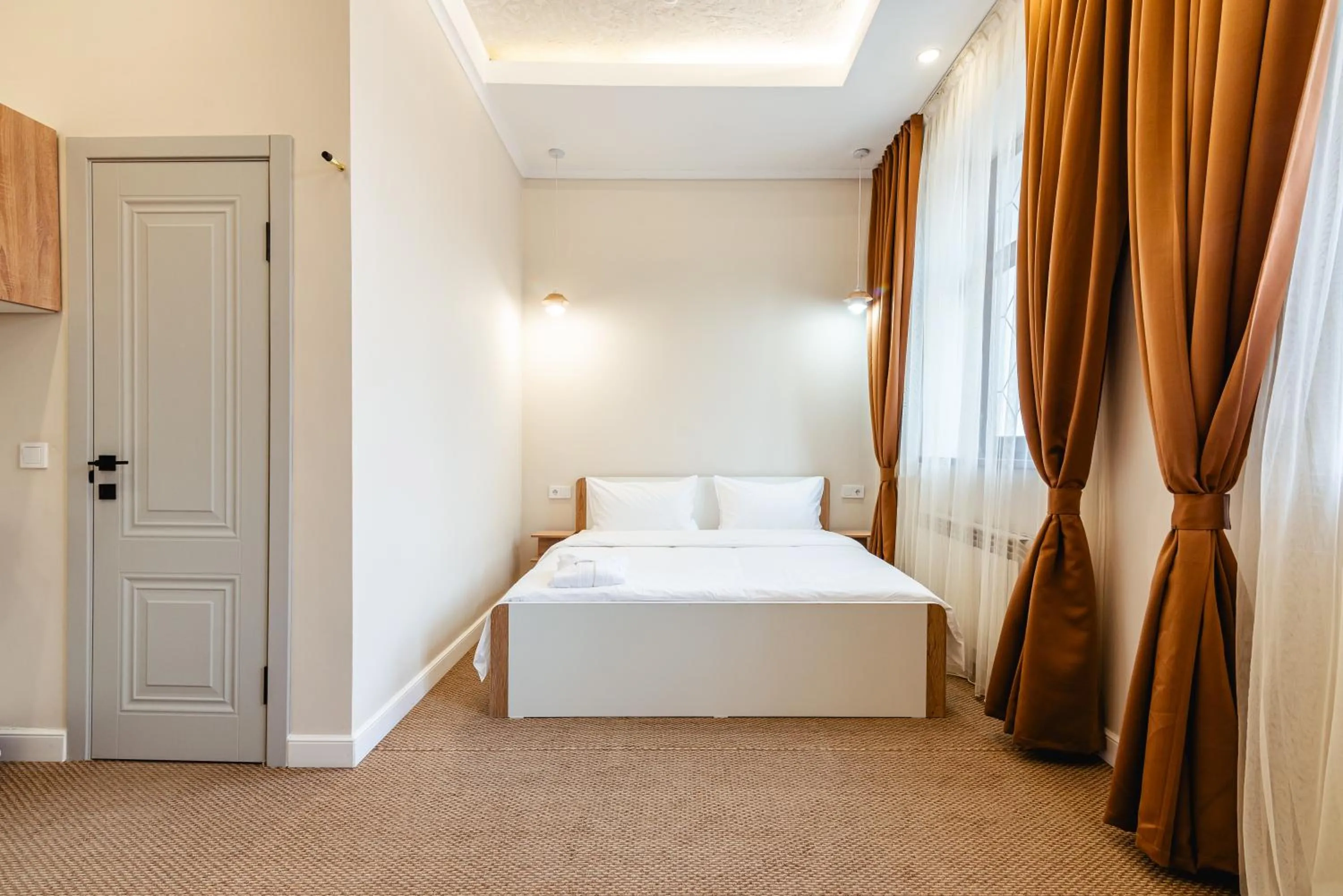 Bed in AYKUN Hotel