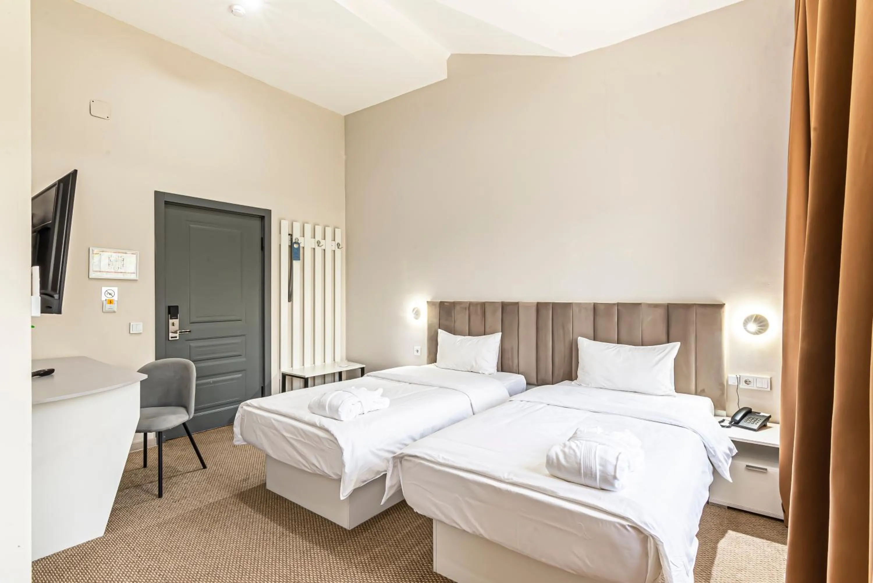 Bed in AYKUN Hotel