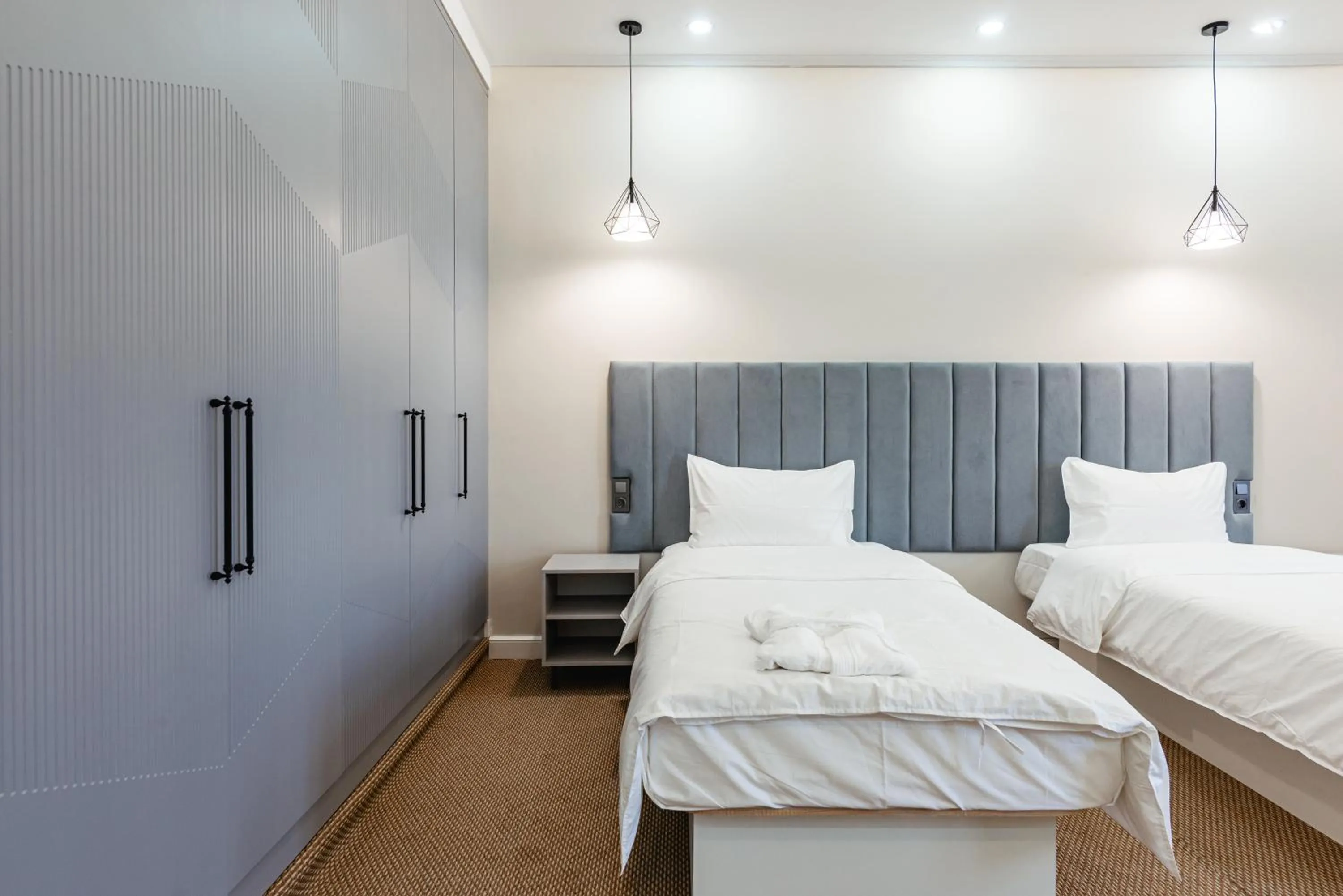 Bed in AYKUN Hotel