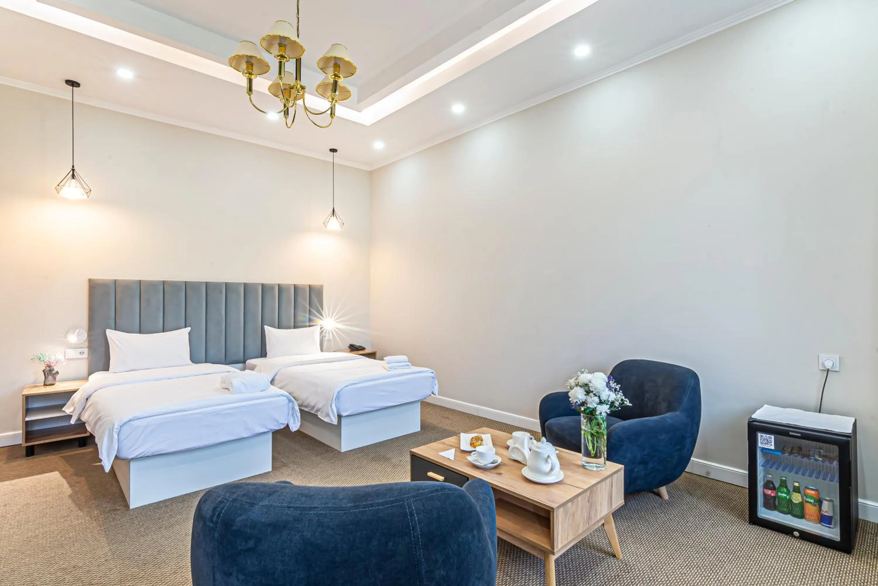 Seating area, Bed in AYKUN Hotel