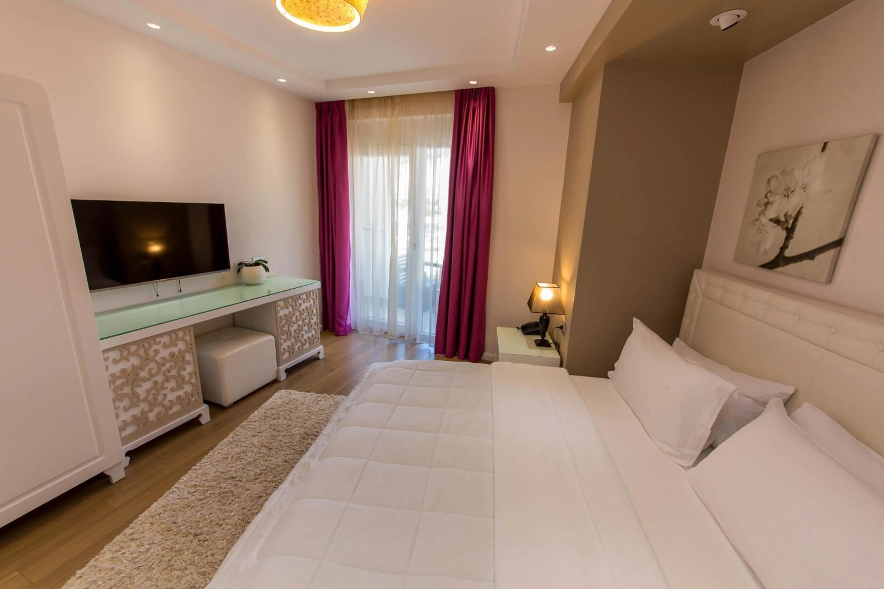 Communal lounge/ TV room, Bed in Demi Hotel