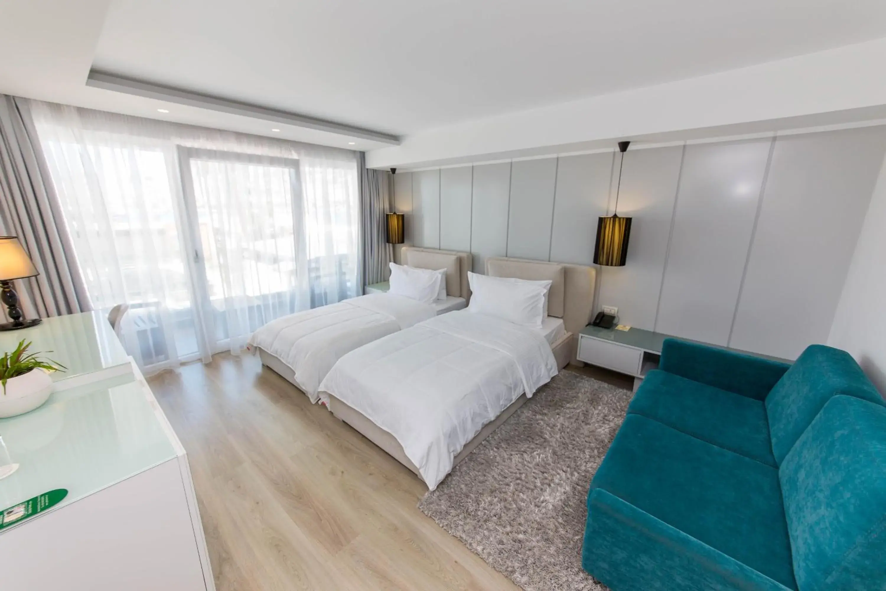 Double or Twin Room with Side Sea View in Demi Hotel Double or Twin Room with Side Sea View in Demi Hotel