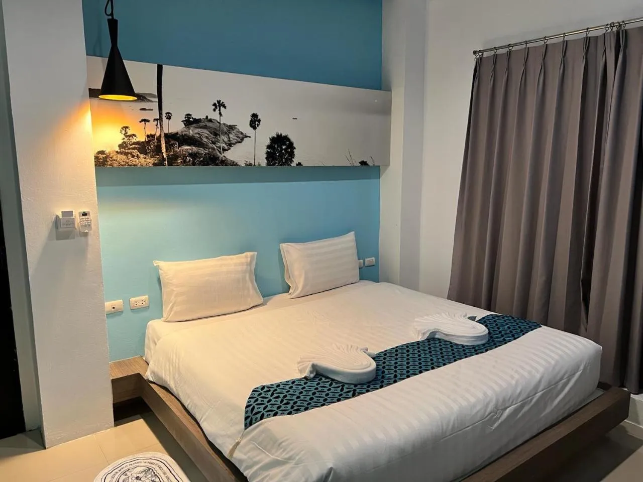 Photo of the whole room, Bed in Hotel The Journey Patong New