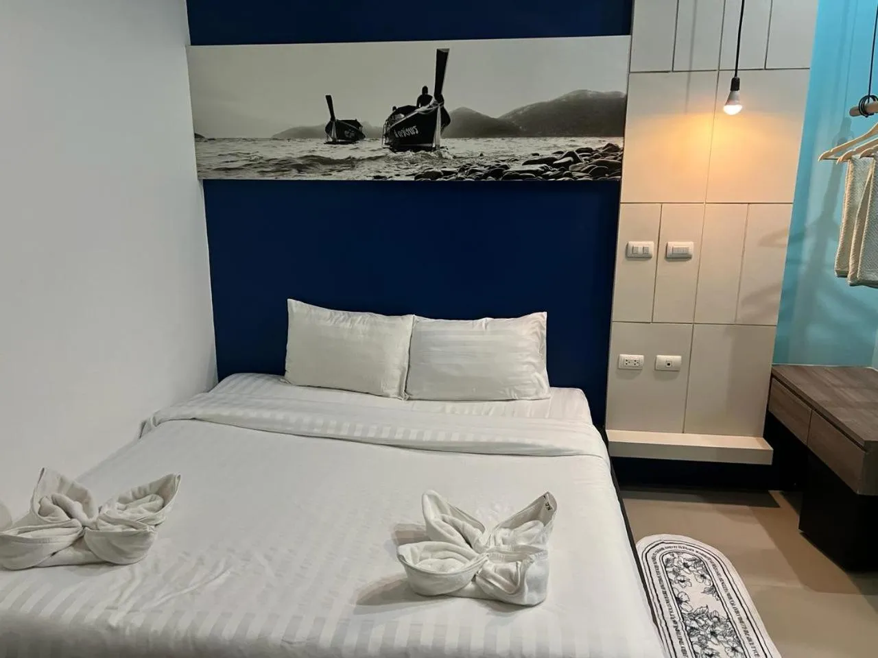 Photo of the whole room, Bed in Hotel The Journey Patong New