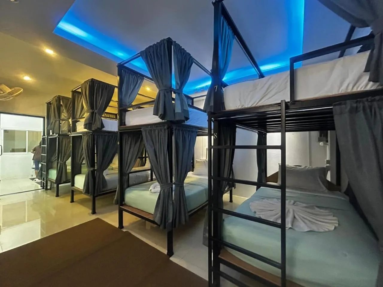 Bed in Male Dormitory Room in Hotel The Journey Patong New