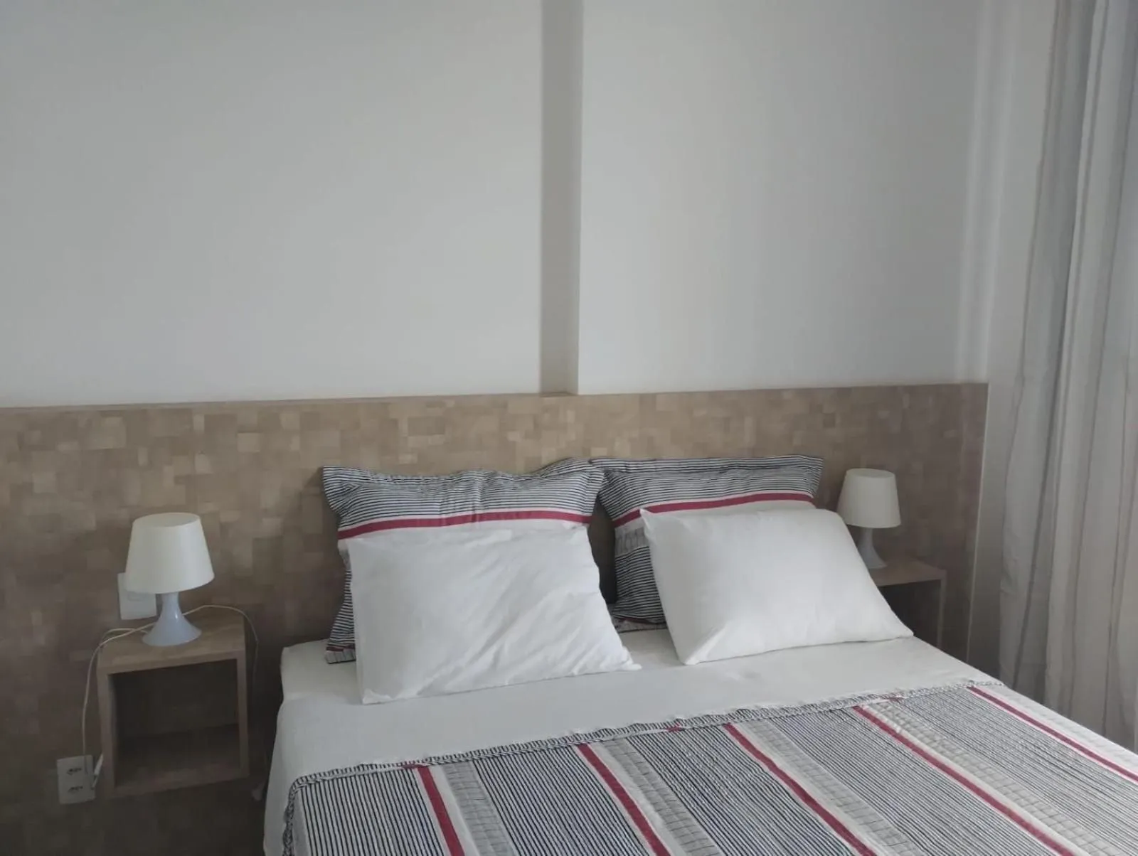 Bed in Mondial Apartments By BnbHost