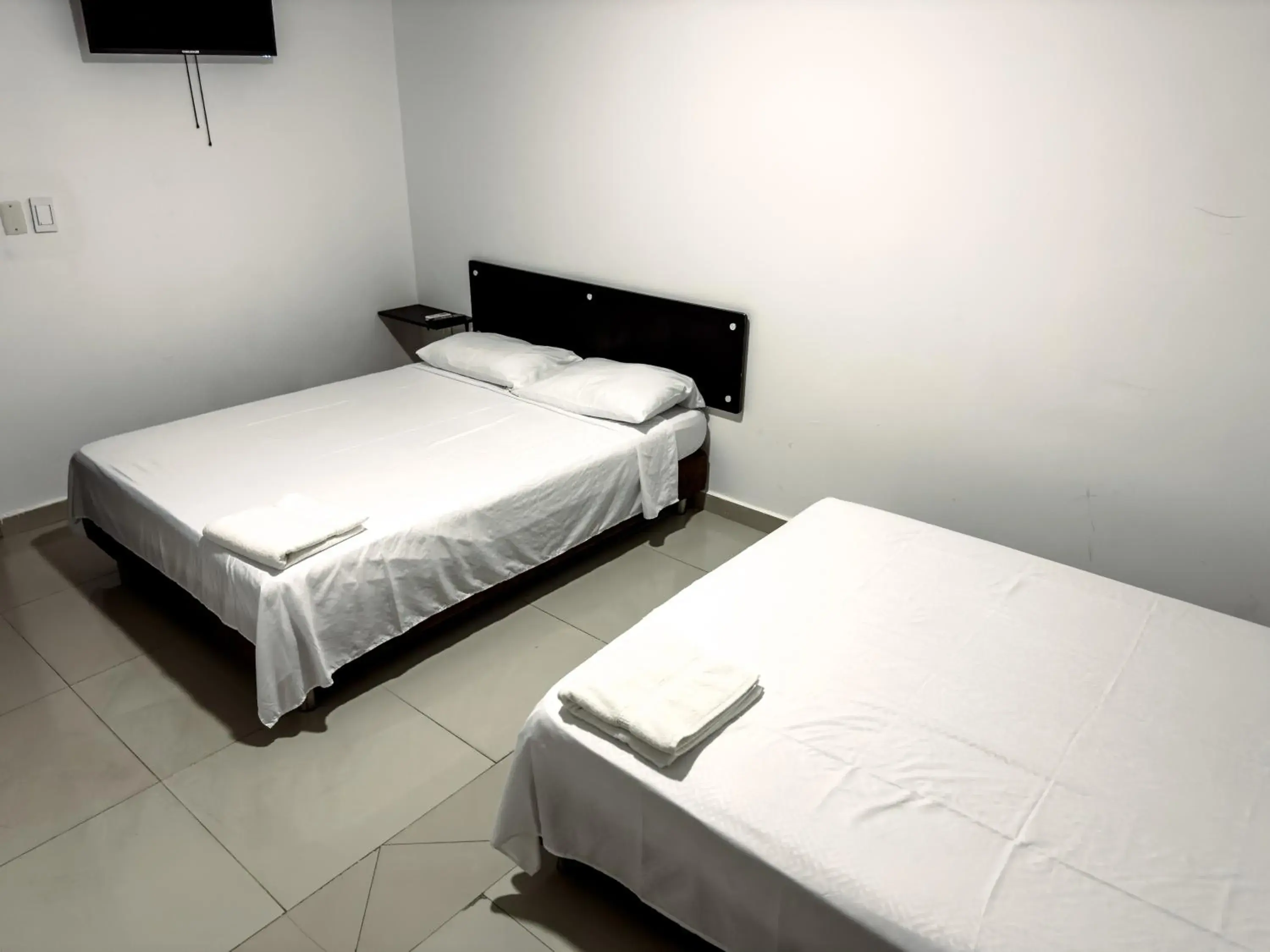 Triple Room in Hotel bazurto plaza Triple Room in Hotel bazurto plaza