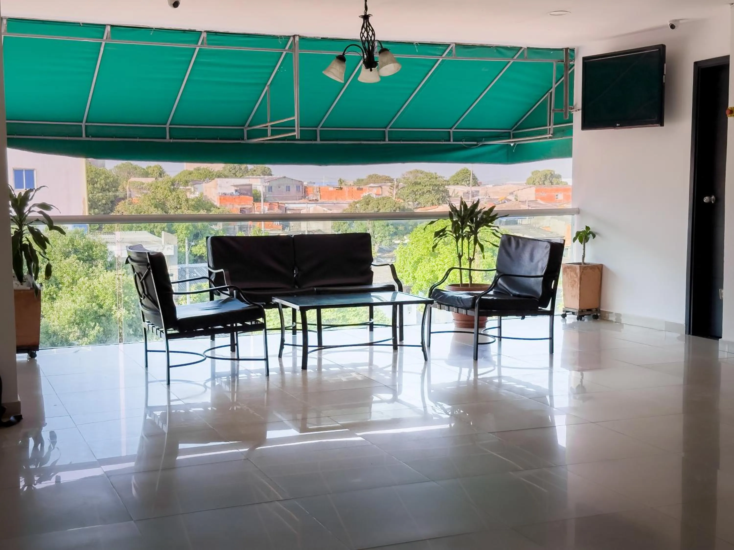 Living room in Hotel bazurto plaza