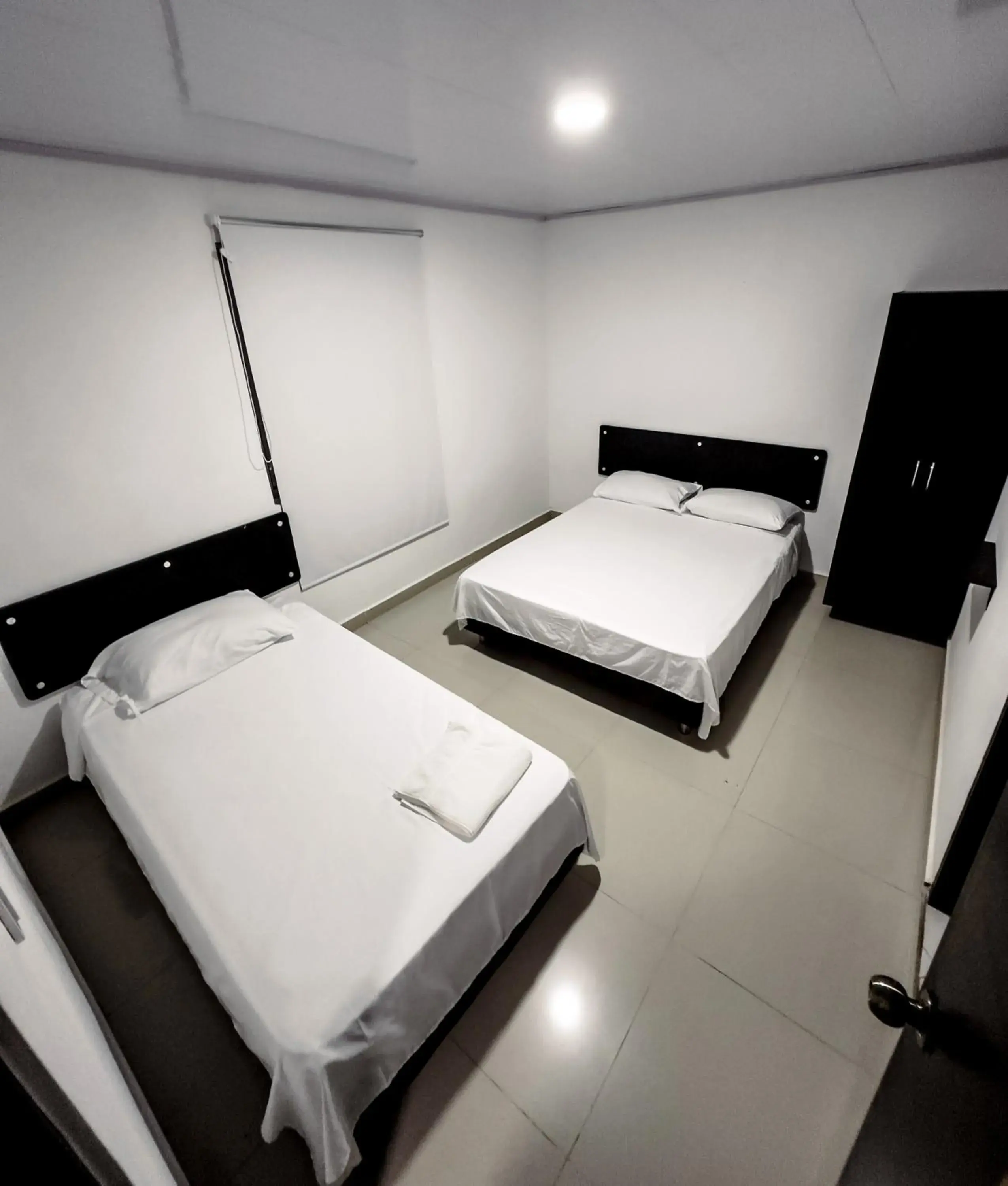 Triple Room in Hotel bazurto plaza Triple Room in Hotel bazurto plaza