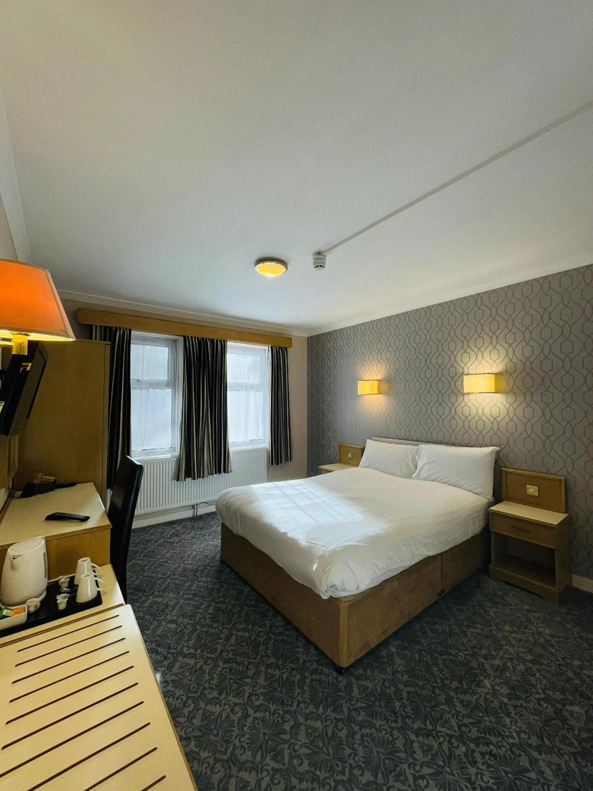 Bed in Westone Manor Hotel