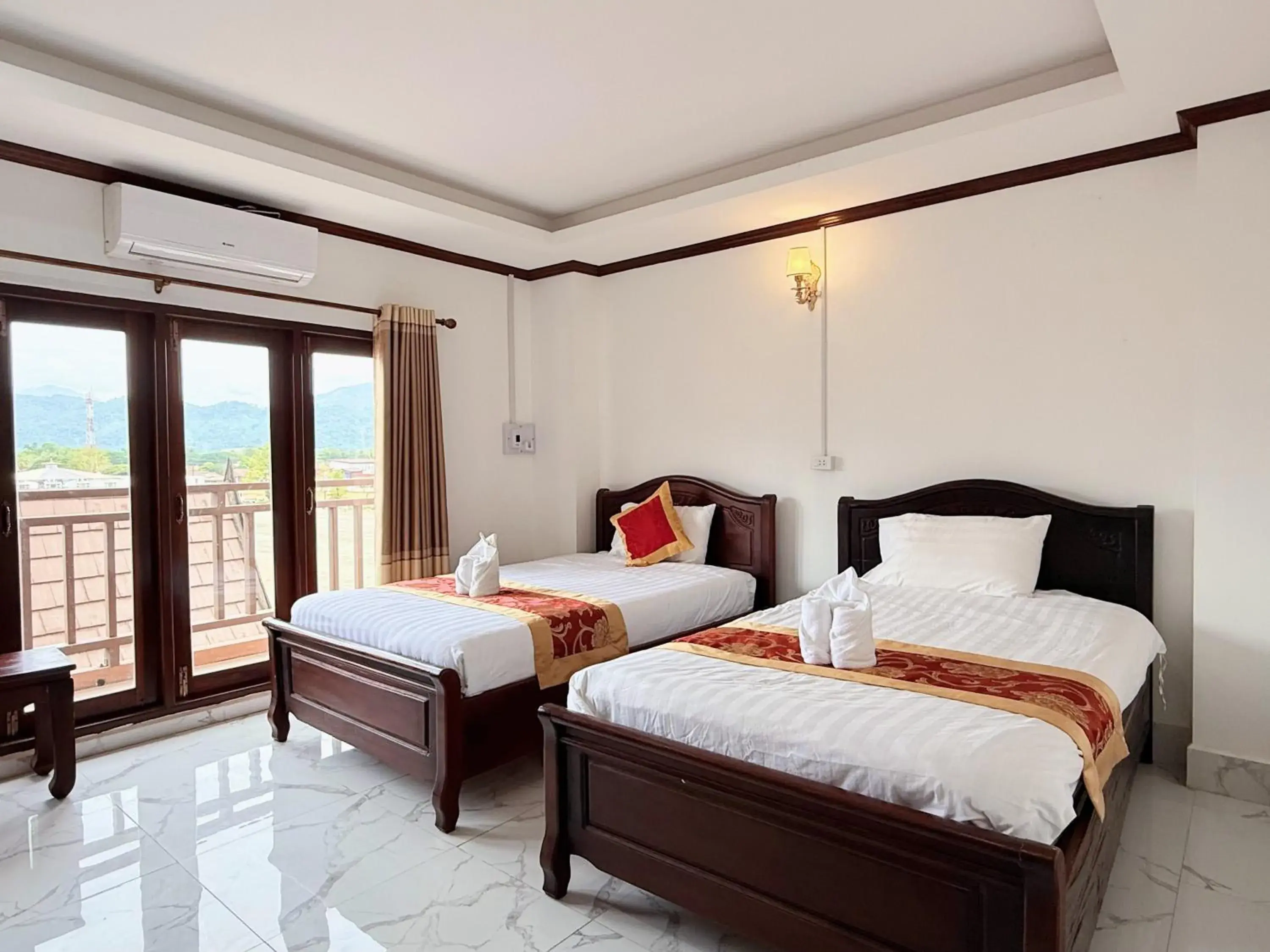 Bed in Vangvieng Sisavang Mountain View Hotel Bed in Vangvieng Sisavang Mountain View Hotel