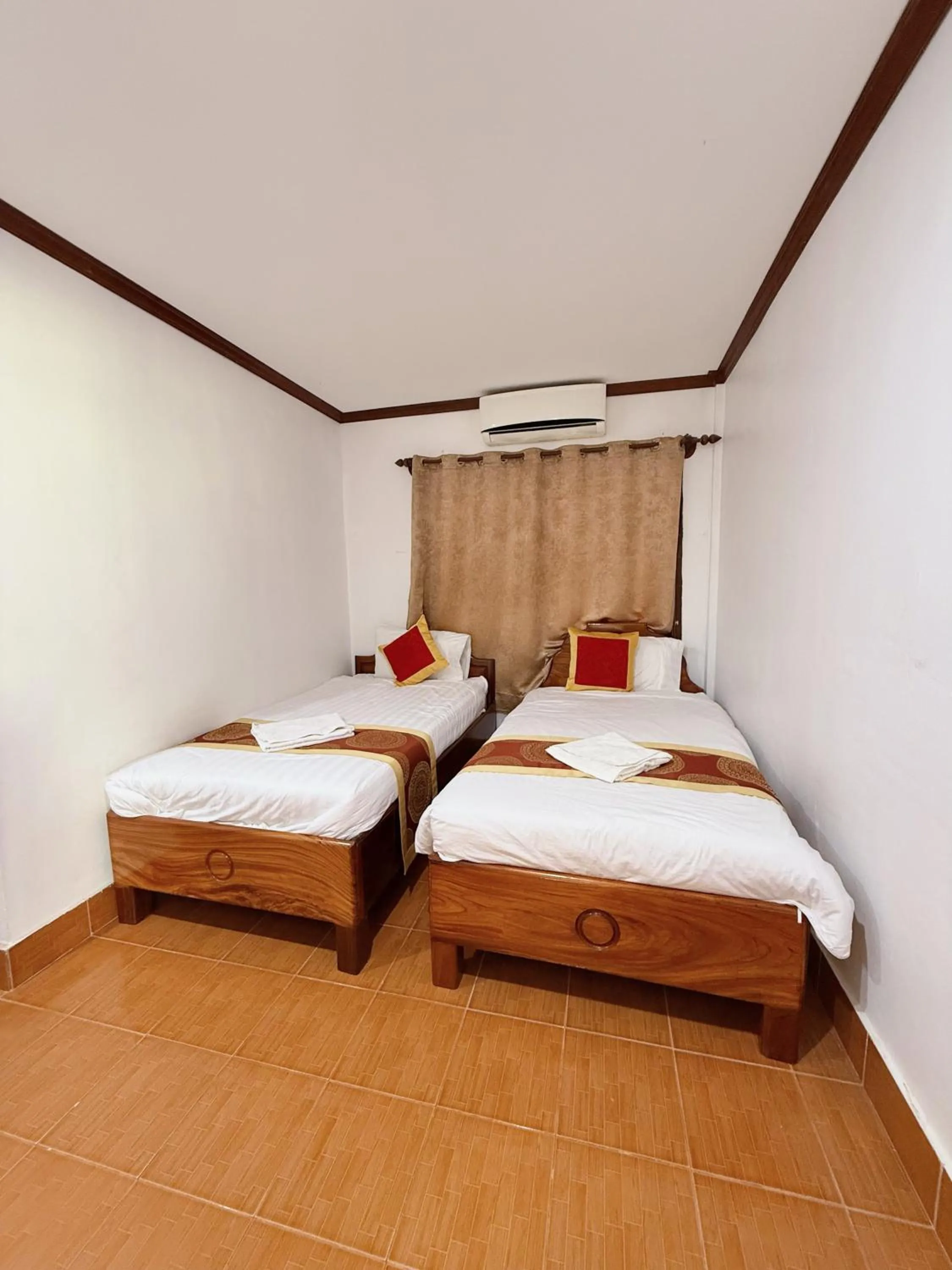 Bed in Vangvieng Sisavang Mountain View Hotel