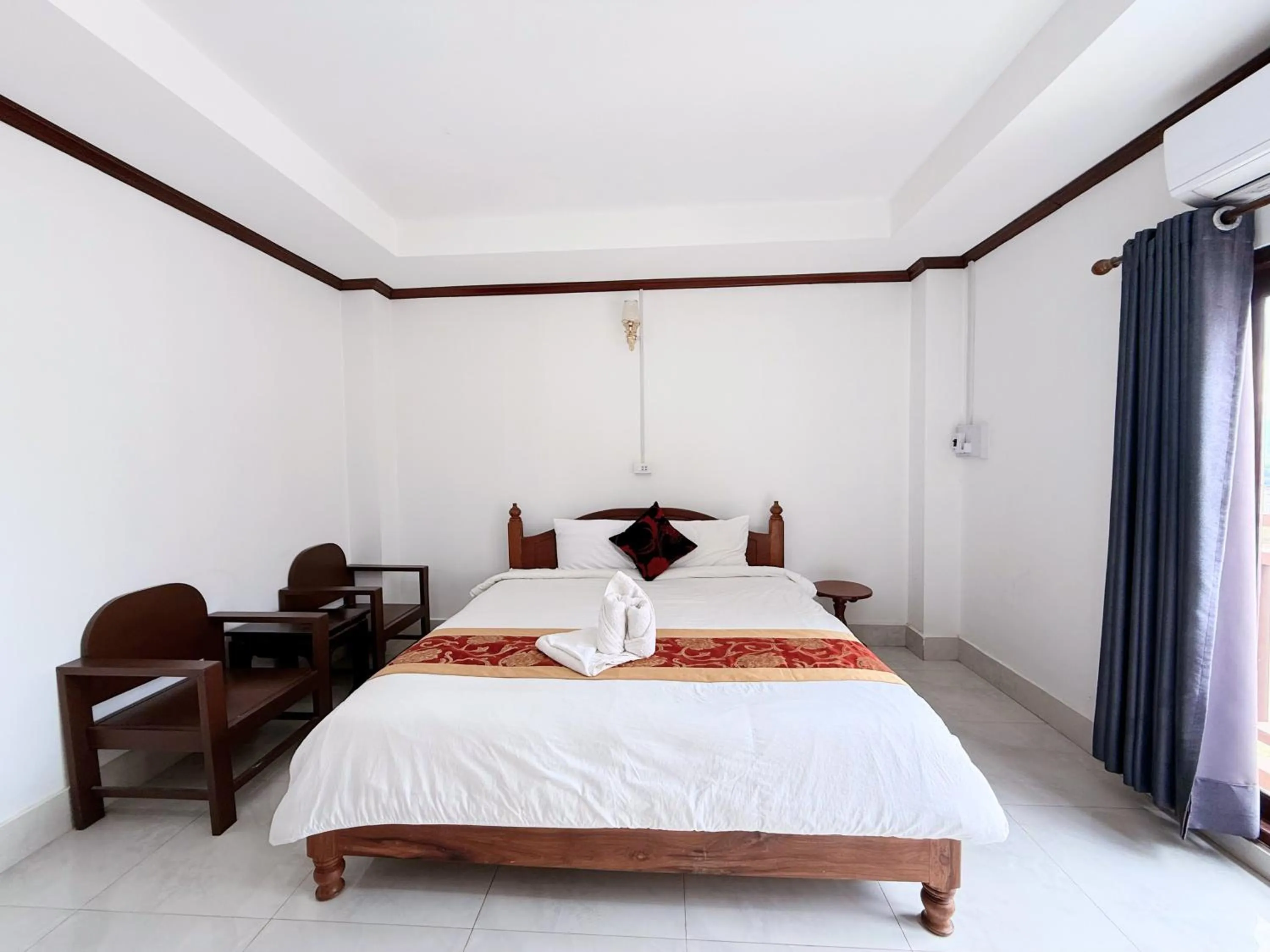 Bed in Vangvieng Sisavang Mountain View Hotel