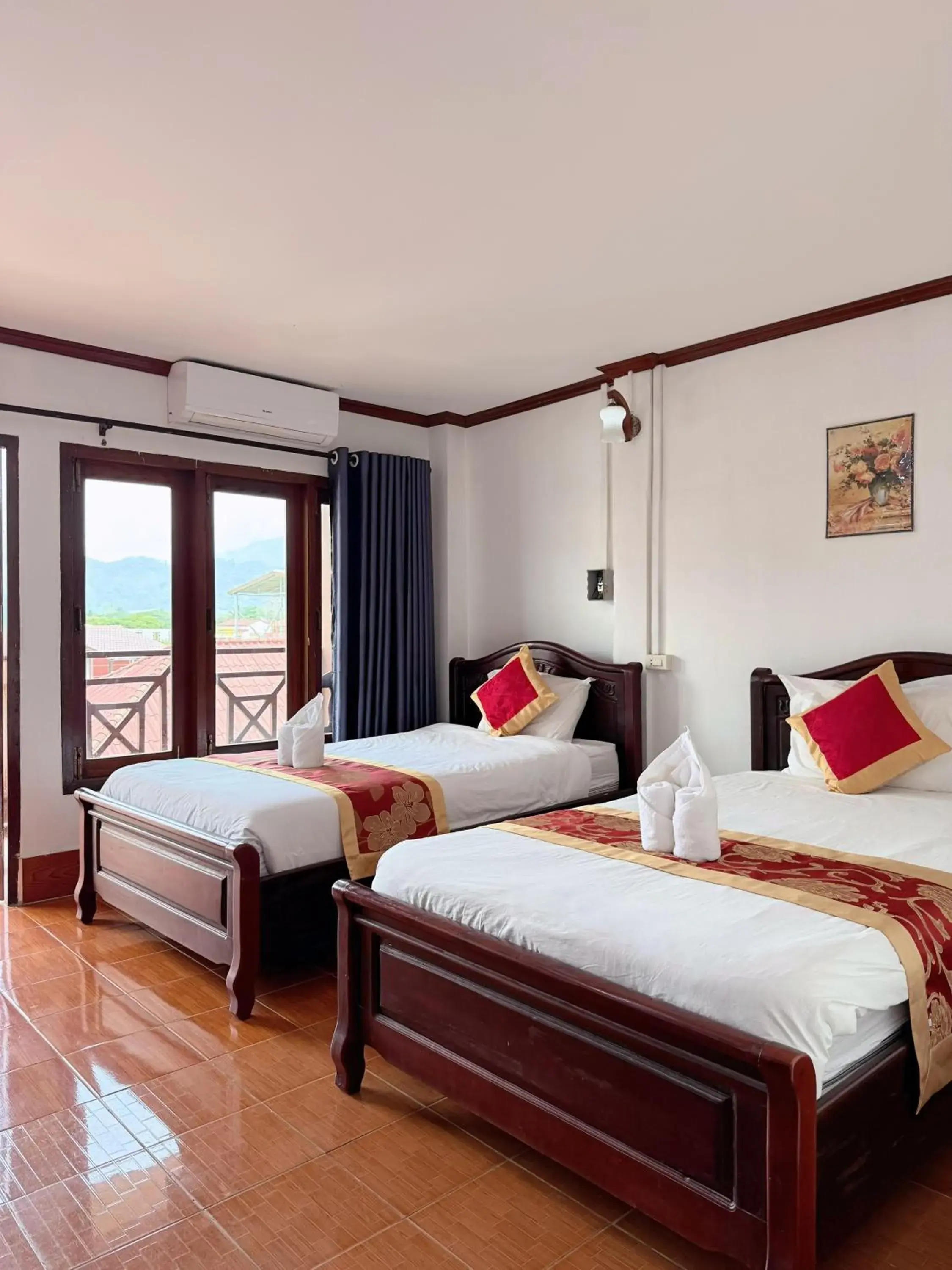 Bed in Vangvieng Sisavang Mountain View Hotel Bed in Vangvieng Sisavang Mountain View Hotel