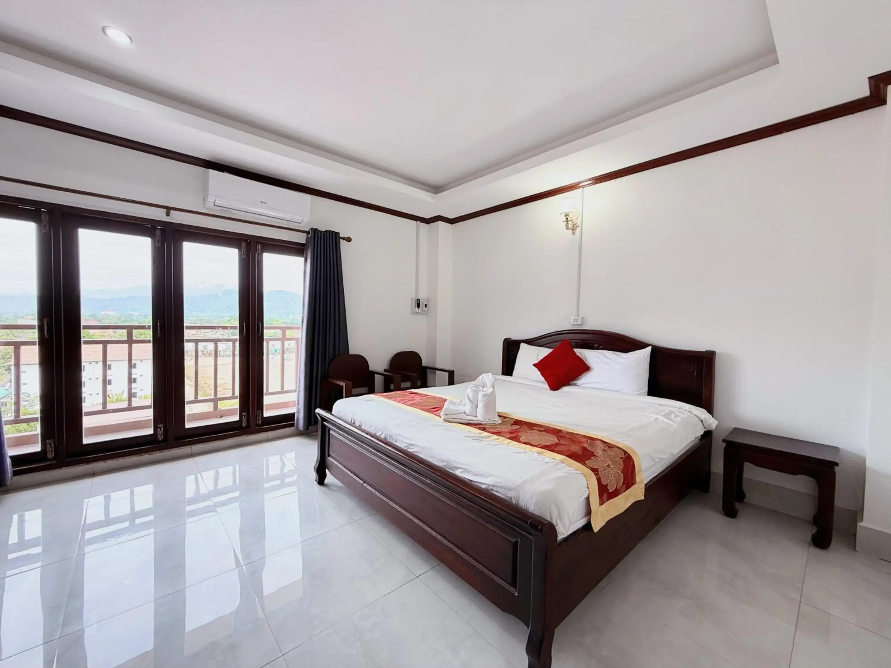 Bed in Vangvieng Sisavang Mountain View Hotel Bed in Vangvieng Sisavang Mountain View Hotel