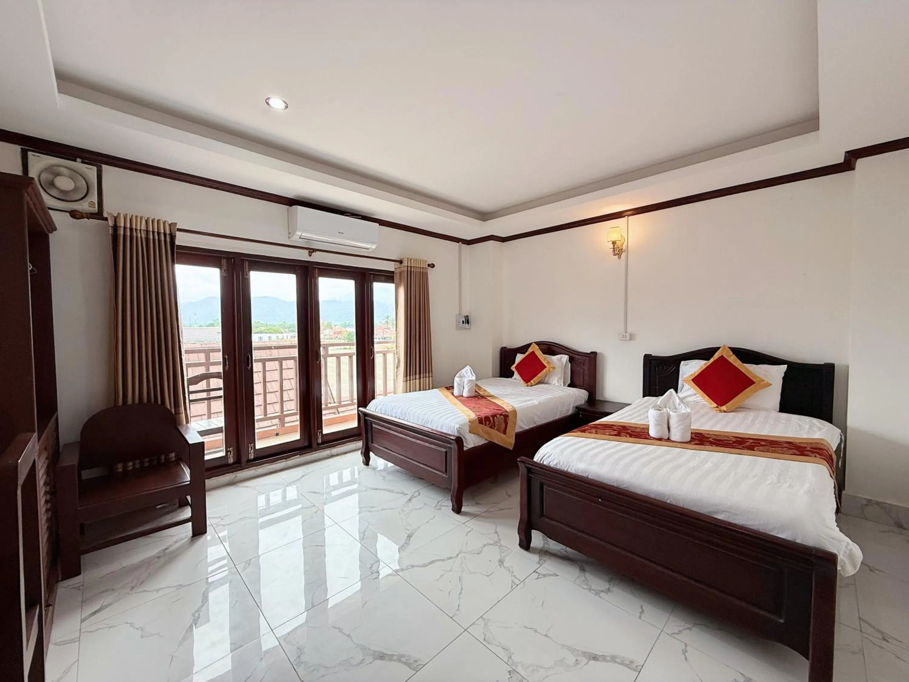 Bed in Vangvieng Sisavang Mountain View Hotel