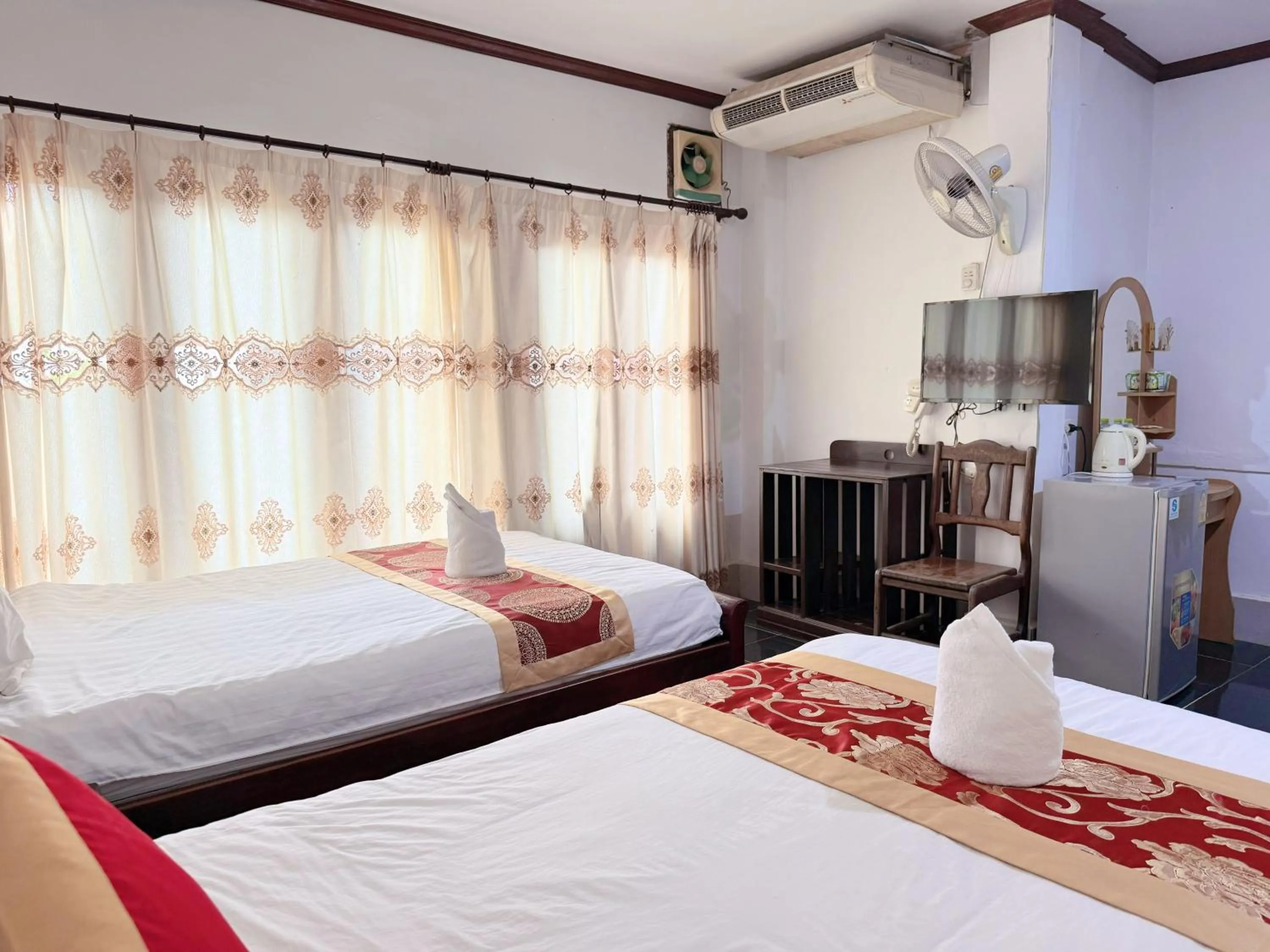 Bed in Vangvieng Sisavang Mountain View Hotel