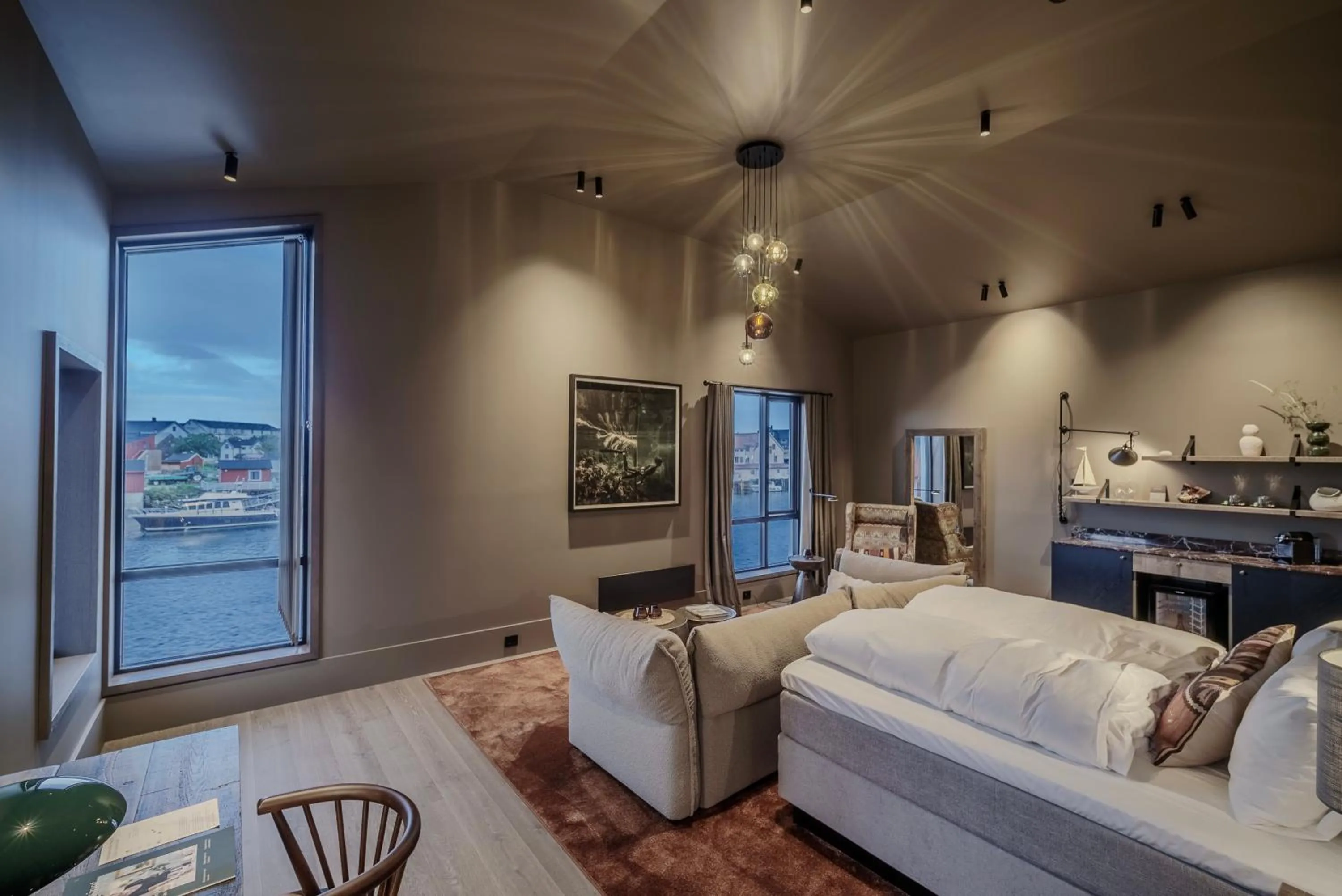 Photo of the whole room, Bed in Henningsvær Bryggehotell - by Classic Norway Hotels