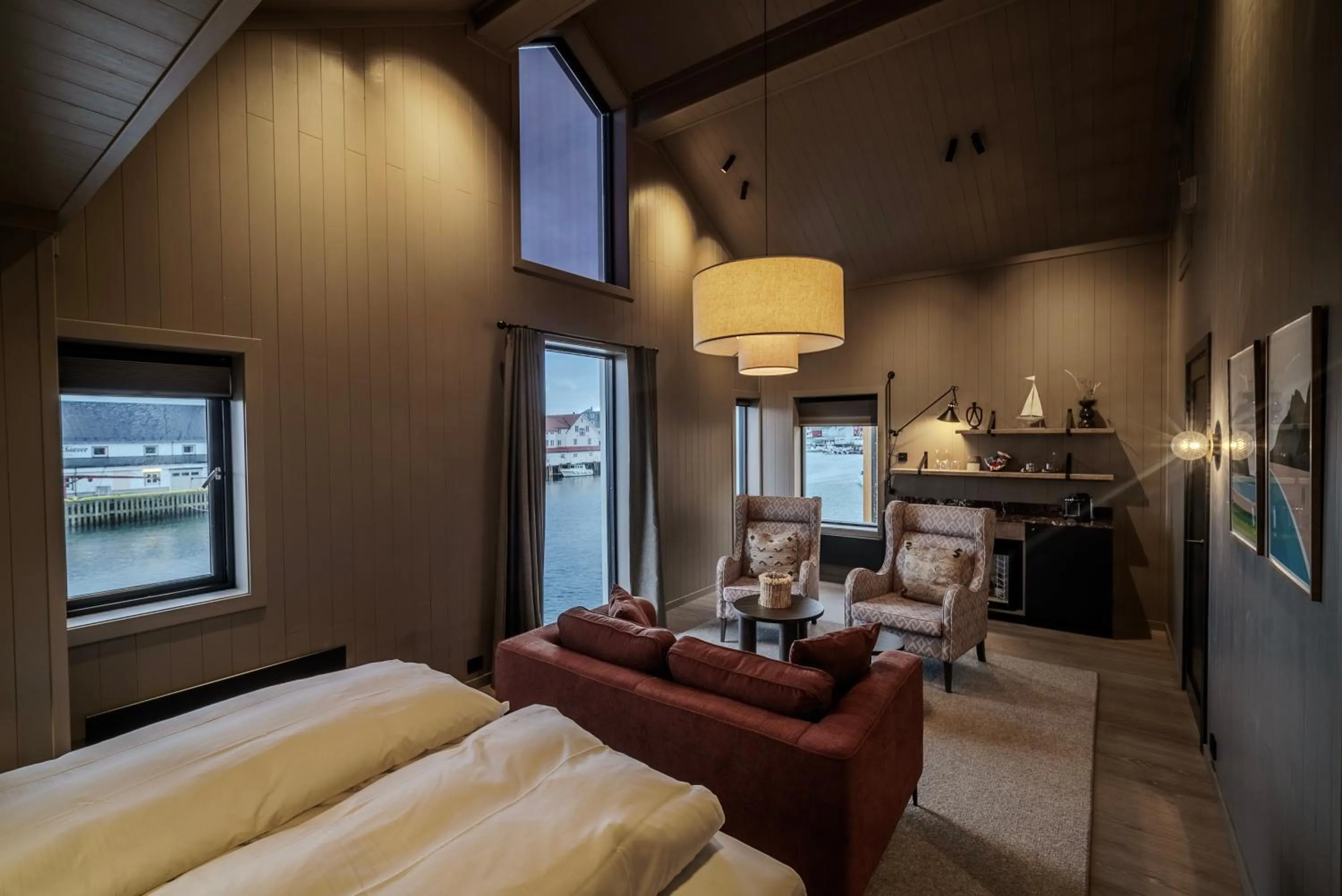 Photo of the whole room, Bed in Henningsvær Bryggehotell - by Classic Norway Hotels