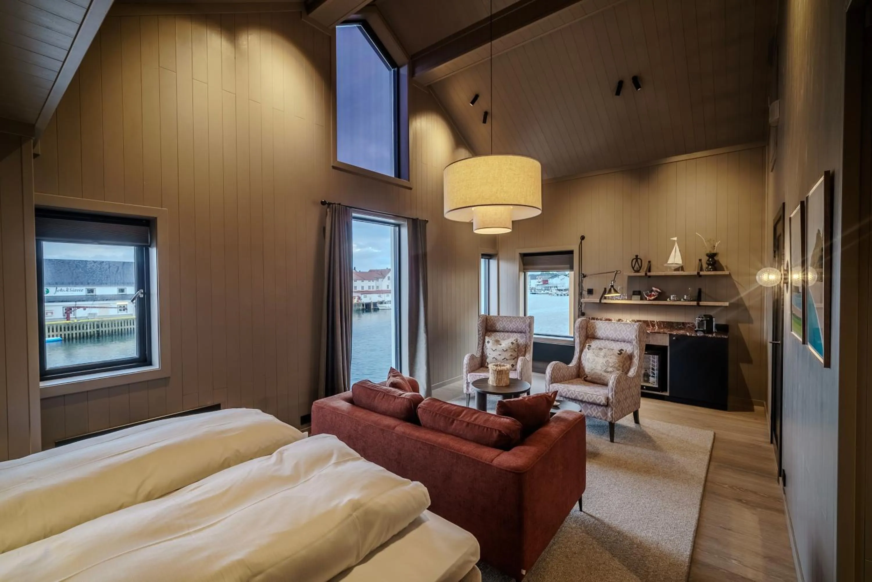 Photo of the whole room, Bed in Henningsvær Bryggehotell - by Classic Norway Hotels