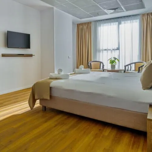 Bed in Sir Fundeni Hotel