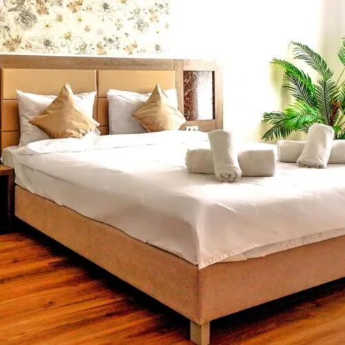 Bed in Sir Fundeni Hotel