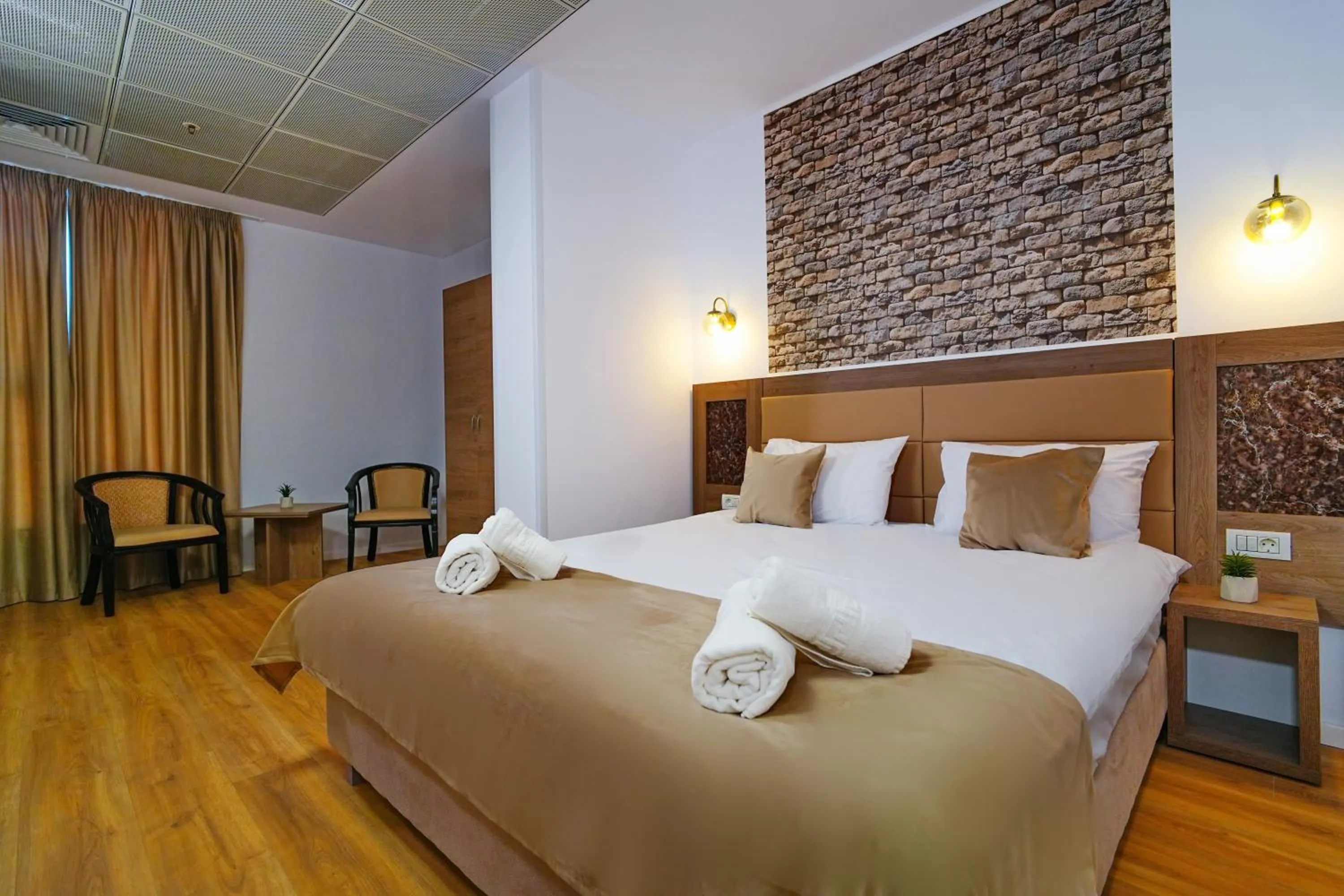 Bed in Sir Fundeni Hotel