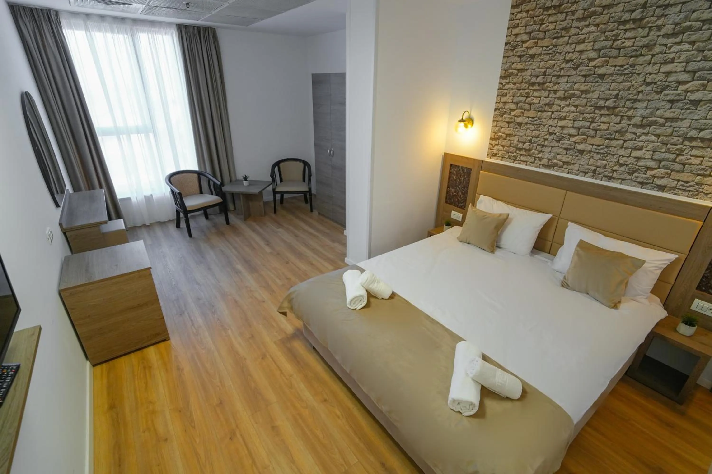 Bed in Sir Fundeni Hotel