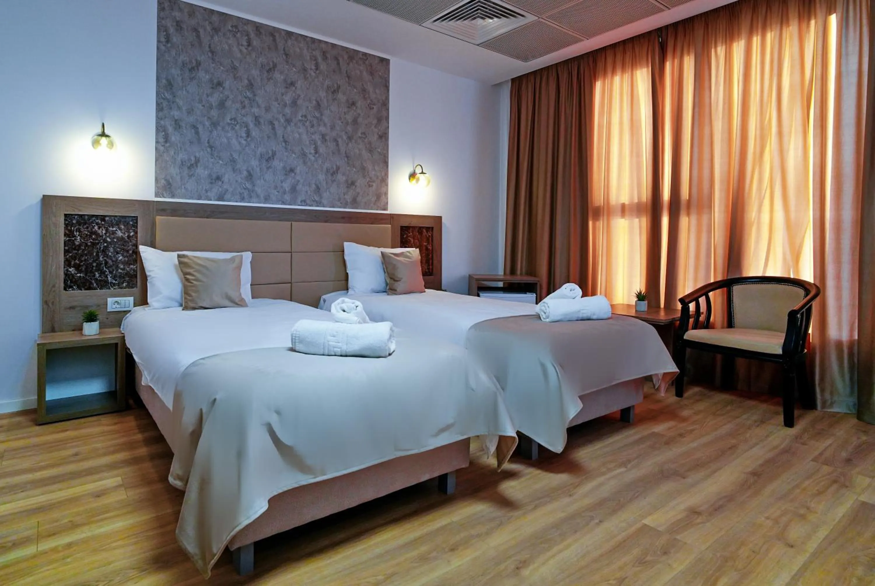 Bed in Sir Fundeni Hotel